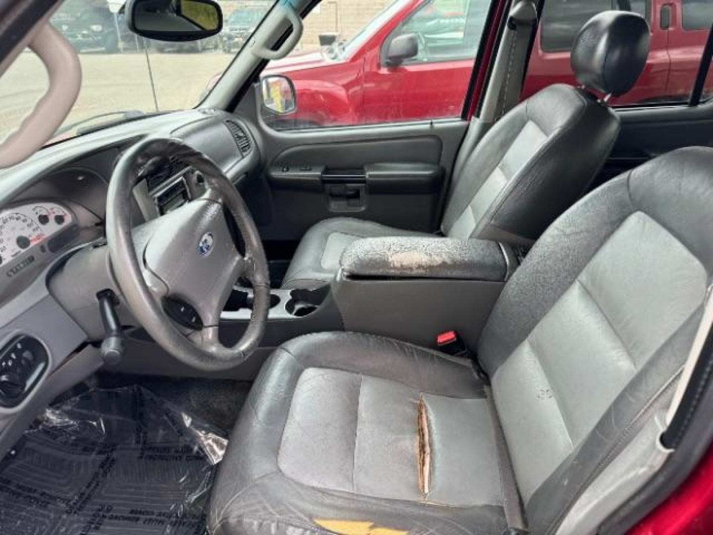 2004 Red Fire Metallic /Medium Dark Flint Cloth Interior Ford Explorer Sport Trac XLT 2WD (1FMZU67K24U) with an 4.0L V6 SOHC 12V FFV engine, 5-Speed Automatic transmission, located at 1865 East Red Hills Pkwy, St. George, 84770, (435) 628-0023, 37.120850, -113.543640 - Photo#10