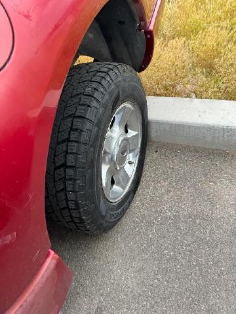 2004 Red Fire Metallic /Medium Dark Flint Cloth Interior Ford Explorer Sport Trac XLT 2WD (1FMZU67K24U) with an 4.0L V6 SOHC 12V FFV engine, 5-Speed Automatic transmission, located at 1865 East Red Hills Pkwy, St. George, 84770, (435) 628-0023, 37.120850, -113.543640 - Photo#8