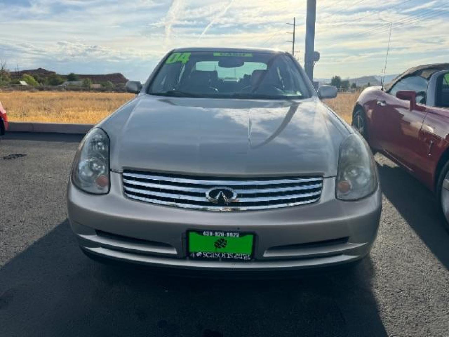 2004 Desert Platinum /Willow Cloth Interio Infiniti G35 Sedan (JNKCV51EX4M) with an 3.5L V6 DOHC 24V engine, 5-Speed Automatic transmission, located at 1865 East Red Hills Pkwy, St. George, 84770, (435) 628-0023, 37.120850, -113.543640 - Photo#1