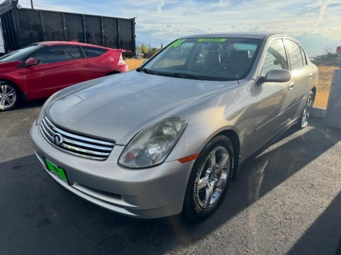 2004 Desert Platinum /Willow Cloth Interio Infiniti G35 Sedan (JNKCV51EX4M) with an 3.5L V6 DOHC 24V engine, 5-Speed Automatic transmission, located at 1865 East Red Hills Pkwy, St. George, 84770, (435) 628-0023, 37.120850, -113.543640 - Photo#2