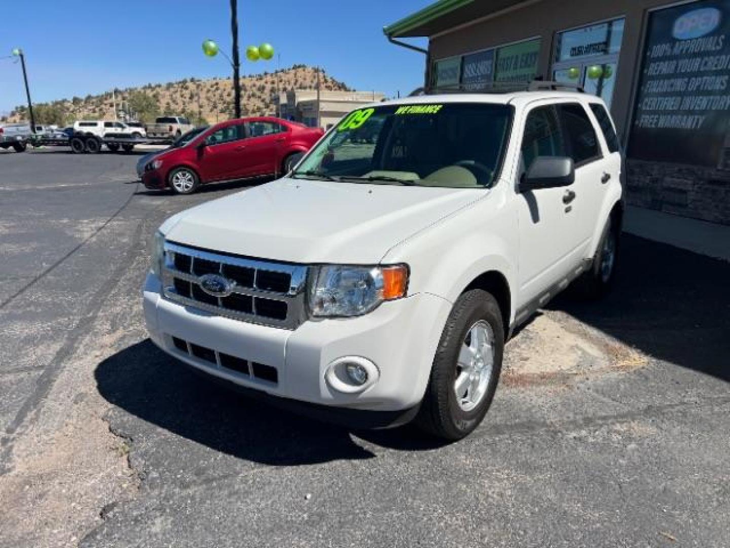 2009 White Suede /Camel Cloth Interior Ford Escape XLT FWD V6 (1FMCU03GX9K) with an 3.0L V6 DOHC 24V engine, 4-Speed Automatic transmission, located at 940 North Main Street, Cedar City, UT, 84720, (435) 628-0023, 37.692936, -113.061897 - We specialize in helping ALL people get the best financing available. No matter your credit score, good, bad or none we can get you an amazing rate. Had a bankruptcy, divorce, or repossessions? We give you the green light to get your credit back on the road. Low down and affordable payments that fit - Photo#3