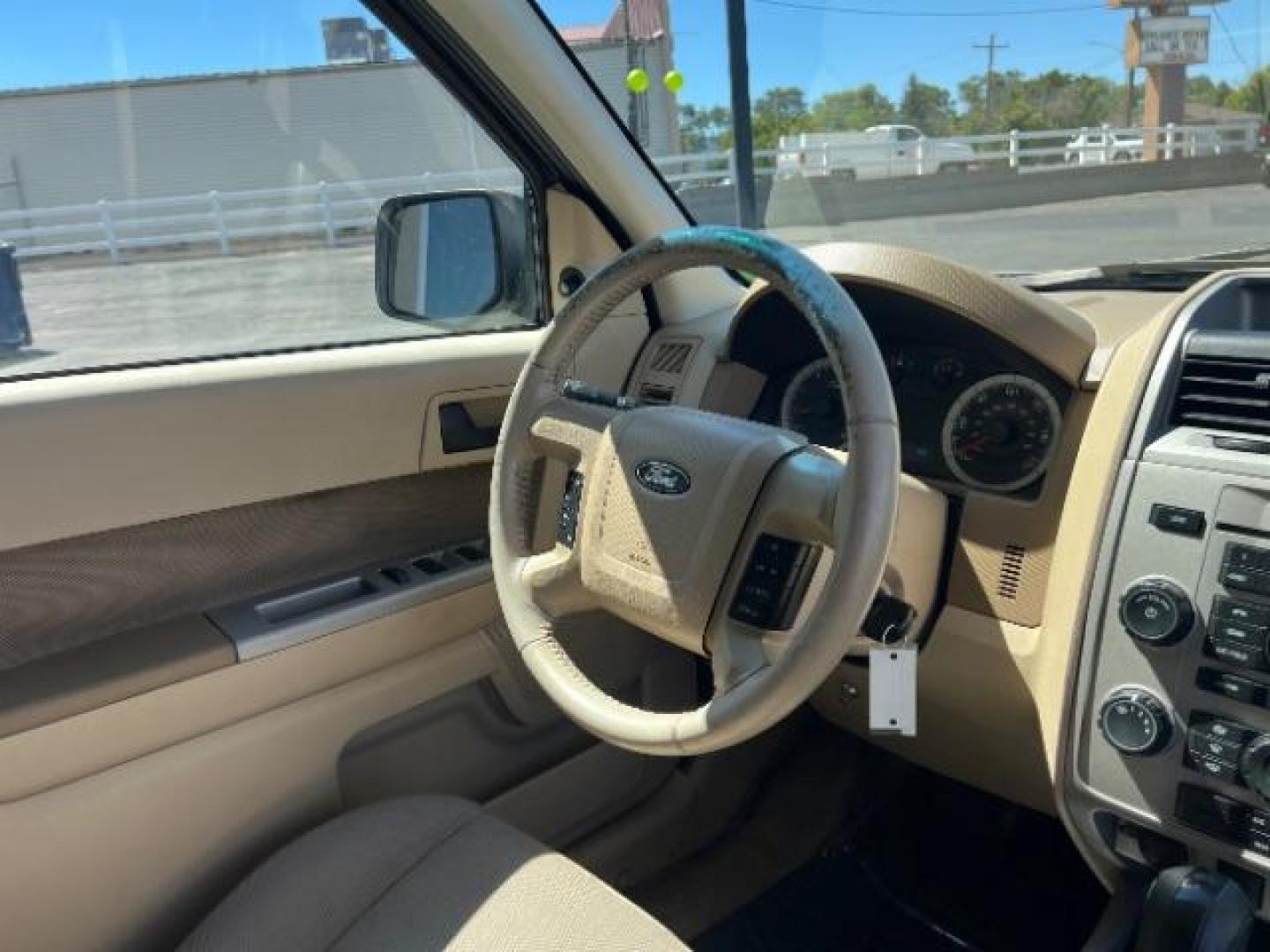 2009 White Suede /Camel Cloth Interior Ford Escape XLT FWD V6 (1FMCU03GX9K) with an 3.0L V6 DOHC 24V engine, 4-Speed Automatic transmission, located at 940 North Main Street, Cedar City, UT, 84720, (435) 628-0023, 37.692936, -113.061897 - We specialize in helping ALL people get the best financing available. No matter your credit score, good, bad or none we can get you an amazing rate. Had a bankruptcy, divorce, or repossessions? We give you the green light to get your credit back on the road. Low down and affordable payments that fit - Photo#33