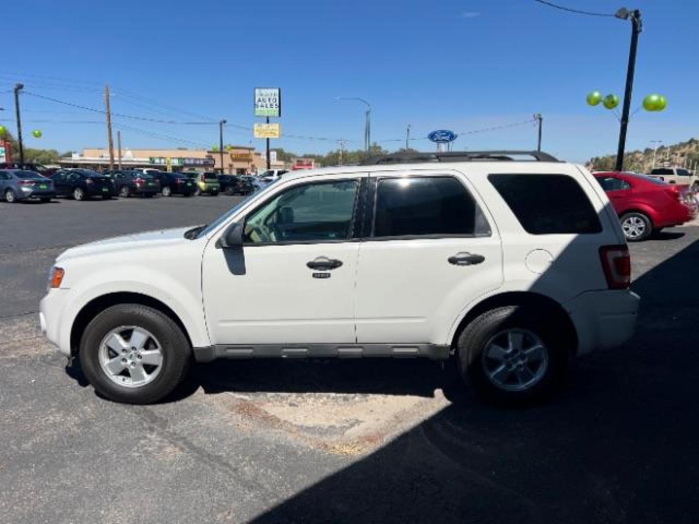 2009 White Suede /Camel Cloth Interior Ford Escape XLT FWD V6 (1FMCU03GX9K) with an 3.0L V6 DOHC 24V engine, 4-Speed Automatic transmission, located at 940 North Main Street, Cedar City, UT, 84720, (435) 628-0023, 37.692936, -113.061897 - We specialize in helping ALL people get the best financing available. No matter your credit score, good, bad or none we can get you an amazing rate. Had a bankruptcy, divorce, or repossessions? We give you the green light to get your credit back on the road. Low down and affordable payments that fit - Photo#7