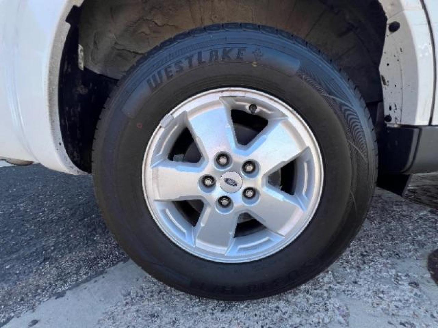 2009 White Suede /Camel Cloth Interior Ford Escape XLT FWD V6 (1FMCU03GX9K) with an 3.0L V6 DOHC 24V engine, 4-Speed Automatic transmission, located at 940 North Main Street, Cedar City, UT, 84720, (435) 628-0023, 37.692936, -113.061897 - We specialize in helping ALL people get the best financing available. No matter your credit score, good, bad or none we can get you an amazing rate. Had a bankruptcy, divorce, or repossessions? We give you the green light to get your credit back on the road. Low down and affordable payments that fit - Photo#8