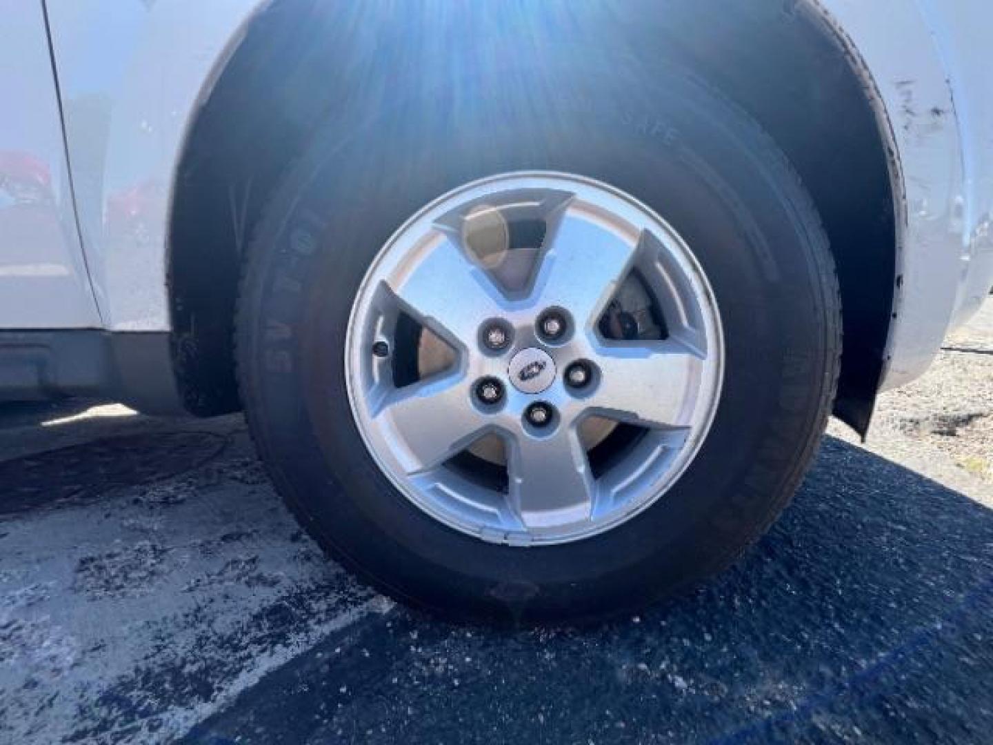 2009 White Suede /Camel Cloth Interior Ford Escape XLT FWD V6 (1FMCU03GX9K) with an 3.0L V6 DOHC 24V engine, 4-Speed Automatic transmission, located at 940 North Main Street, Cedar City, UT, 84720, (435) 628-0023, 37.692936, -113.061897 - We specialize in helping ALL people get the best financing available. No matter your credit score, good, bad or none we can get you an amazing rate. Had a bankruptcy, divorce, or repossessions? We give you the green light to get your credit back on the road. Low down and affordable payments that fit - Photo#9