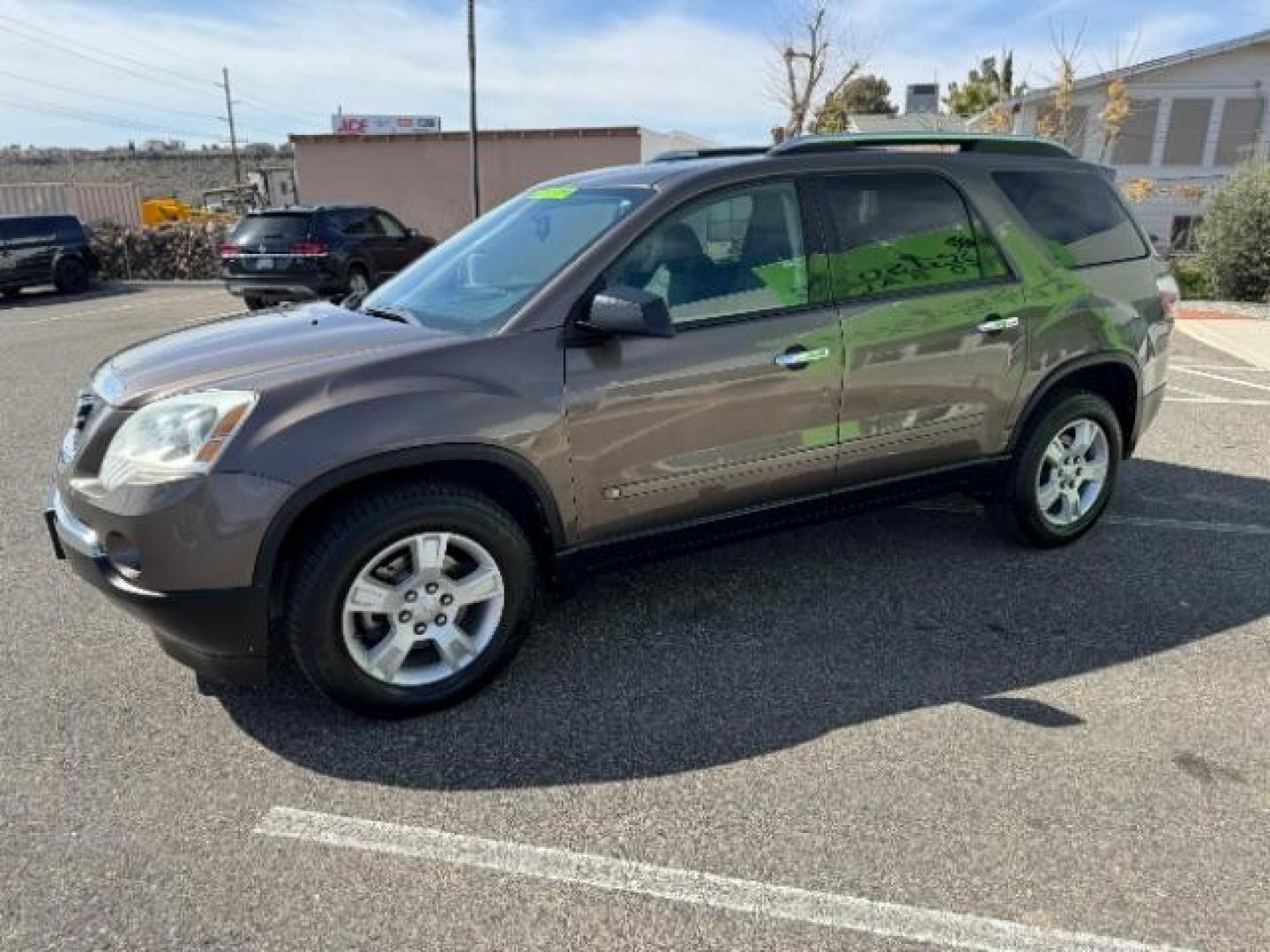 2009 Medium Brown Metalli /Ebony Cloth Interior GMC Acadia SLE-1 FWD (1GKER13D49J) with an 3.6L V6 DOHC 24V engine, 6-Speed Automatic transmission, located at 1865 East Red Hills Pkwy, St. George, 84770, (435) 628-0023, 37.120850, -113.543640 - Photo#4