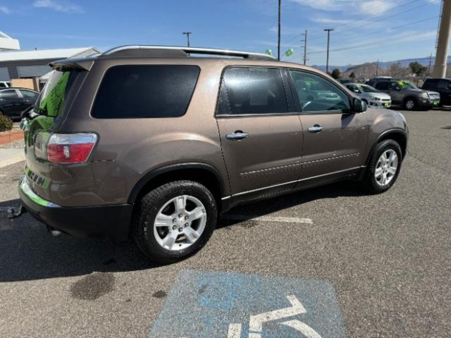 2009 Medium Brown Metalli /Ebony Cloth Interior GMC Acadia SLE-1 FWD (1GKER13D49J) with an 3.6L V6 DOHC 24V engine, 6-Speed Automatic transmission, located at 1865 East Red Hills Pkwy, St. George, 84770, (435) 628-0023, 37.120850, -113.543640 - Photo#10