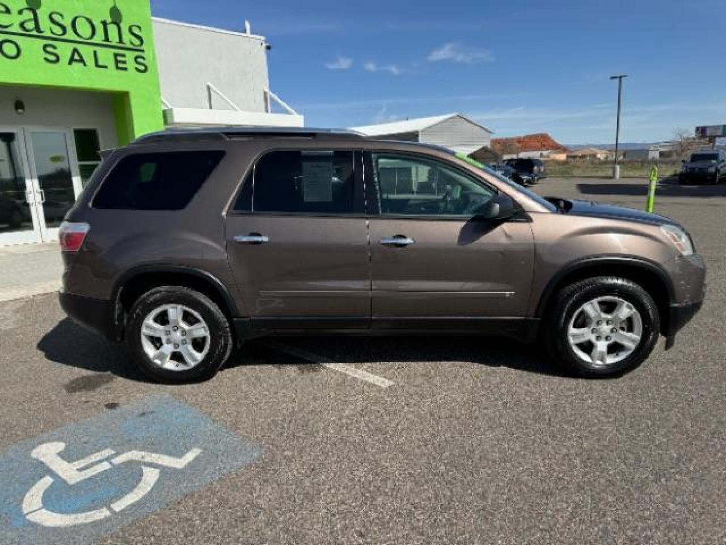 2009 Medium Brown Metalli /Ebony Cloth Interior GMC Acadia SLE-1 FWD (1GKER13D49J) with an 3.6L V6 DOHC 24V engine, 6-Speed Automatic transmission, located at 1865 East Red Hills Pkwy, St. George, 84770, (435) 628-0023, 37.120850, -113.543640 - Photo#11