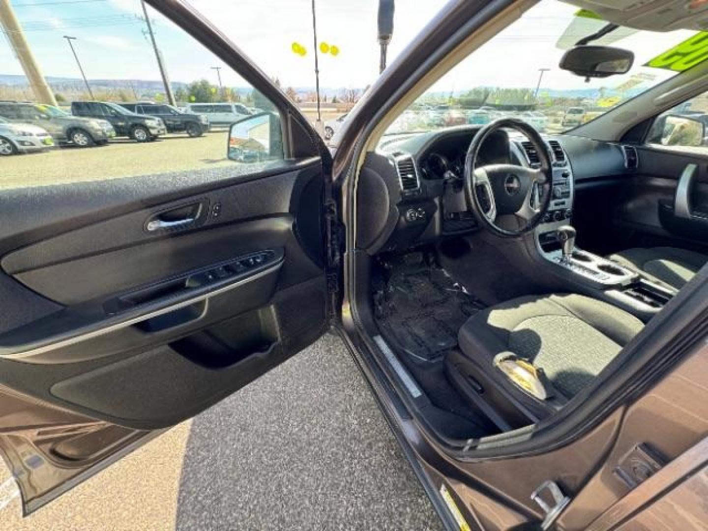 2009 Medium Brown Metalli /Ebony Cloth Interior GMC Acadia SLE-1 FWD (1GKER13D49J) with an 3.6L V6 DOHC 24V engine, 6-Speed Automatic transmission, located at 1865 East Red Hills Pkwy, St. George, 84770, (435) 628-0023, 37.120850, -113.543640 - Photo#16