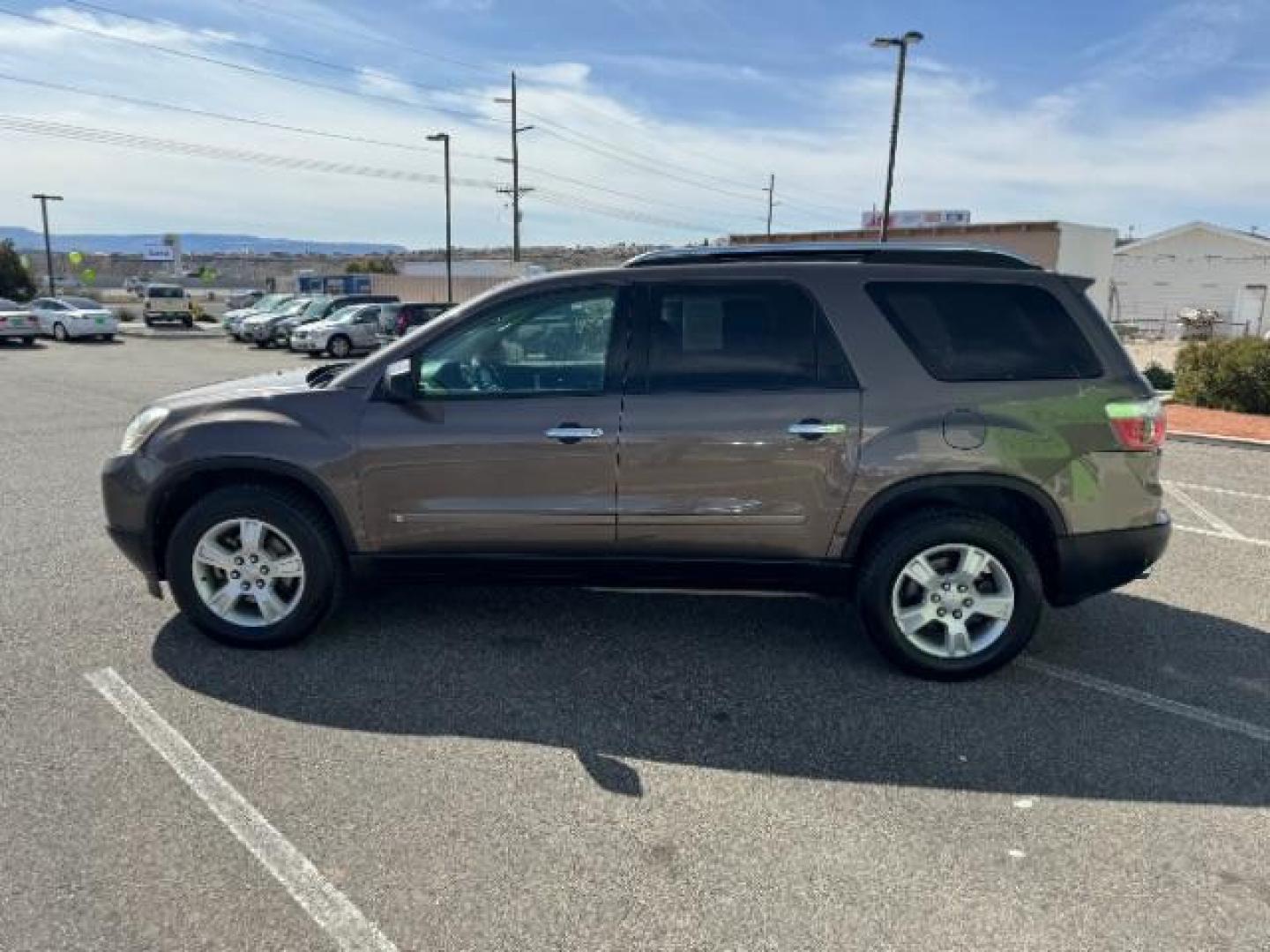 2009 Medium Brown Metalli /Ebony Cloth Interior GMC Acadia SLE-1 FWD (1GKER13D49J) with an 3.6L V6 DOHC 24V engine, 6-Speed Automatic transmission, located at 1865 East Red Hills Pkwy, St. George, 84770, (435) 628-0023, 37.120850, -113.543640 - Photo#5