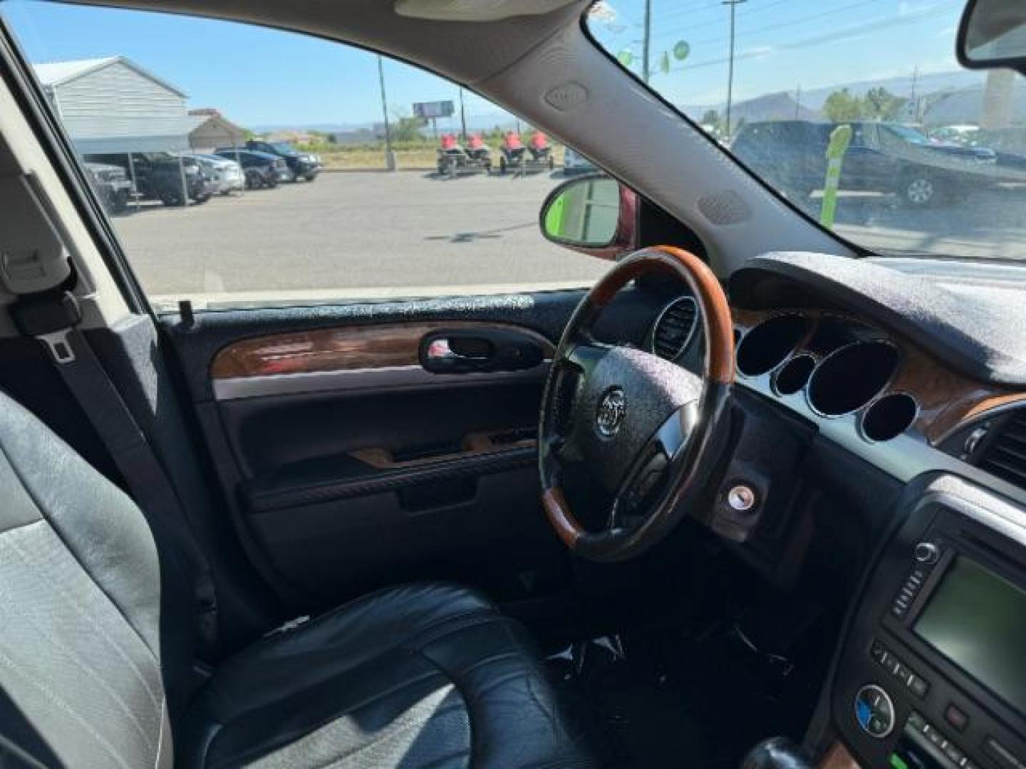 2011 Red Jewel Tintcoat /Ebony Leather Interi Buick Enclave CXL-2 FWD (5GAKRCED3BJ) with an 3.6L V6 DOHC 24V engine, 6-Speed Automatic Ov transmission, located at 940 North Main Street, Cedar City, UT, 84720, (435) 628-0023, 37.692936, -113.061897 - We specialize in helping ALL people get the best financing available. No matter your credit score, good, bad or none we can get you an amazing rate. Had a bankruptcy, divorce, or repossessions? We give you the green light to get your credit back on the road. Low down and affordable payments that fit - Photo#36