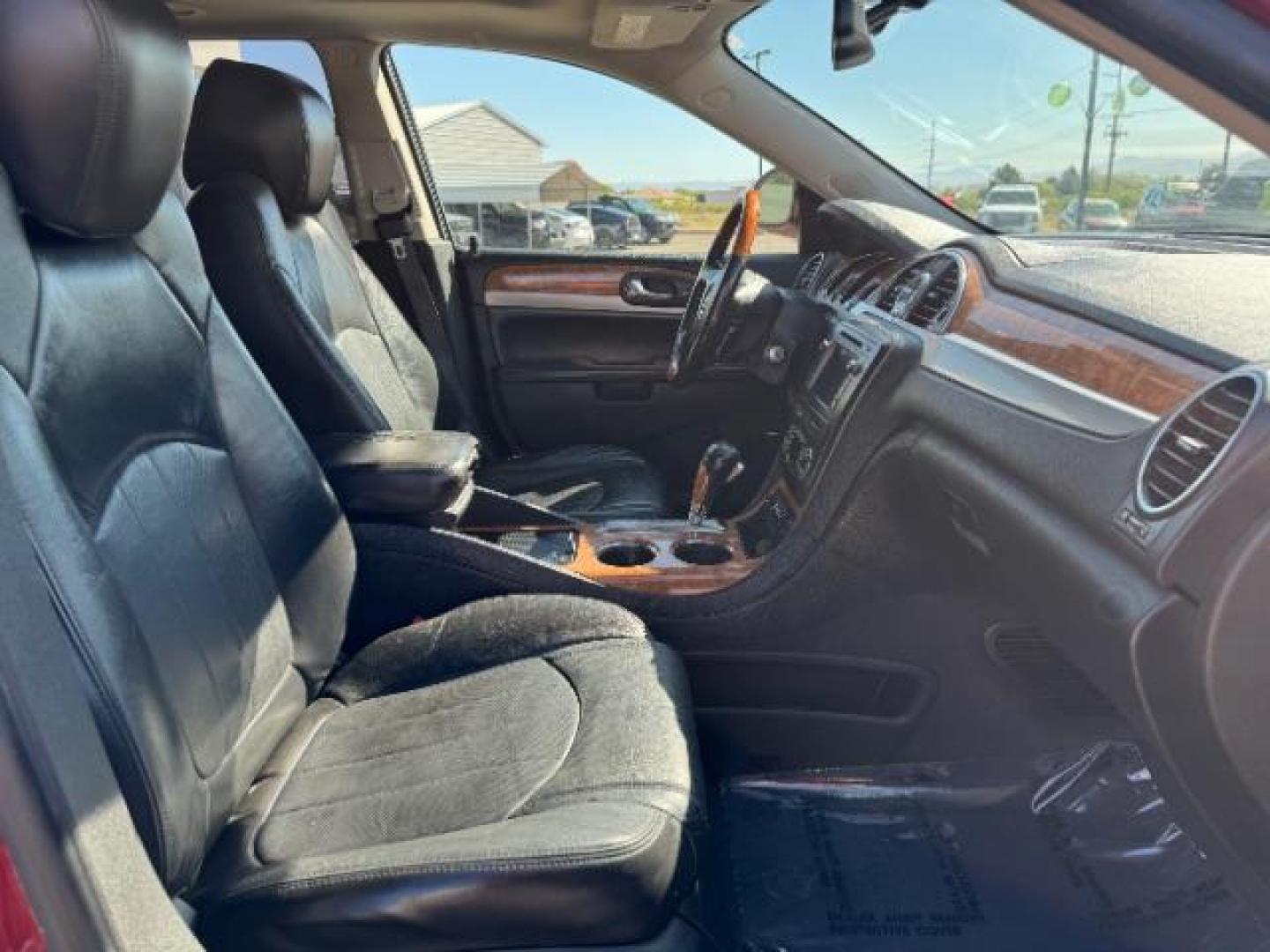 2011 Red Jewel Tintcoat /Ebony Leather Interi Buick Enclave CXL-2 FWD (5GAKRCED3BJ) with an 3.6L V6 DOHC 24V engine, 6-Speed Automatic Ov transmission, located at 940 North Main Street, Cedar City, UT, 84720, (435) 628-0023, 37.692936, -113.061897 - We specialize in helping ALL people get the best financing available. No matter your credit score, good, bad or none we can get you an amazing rate. Had a bankruptcy, divorce, or repossessions? We give you the green light to get your credit back on the road. Low down and affordable payments that fit - Photo#34