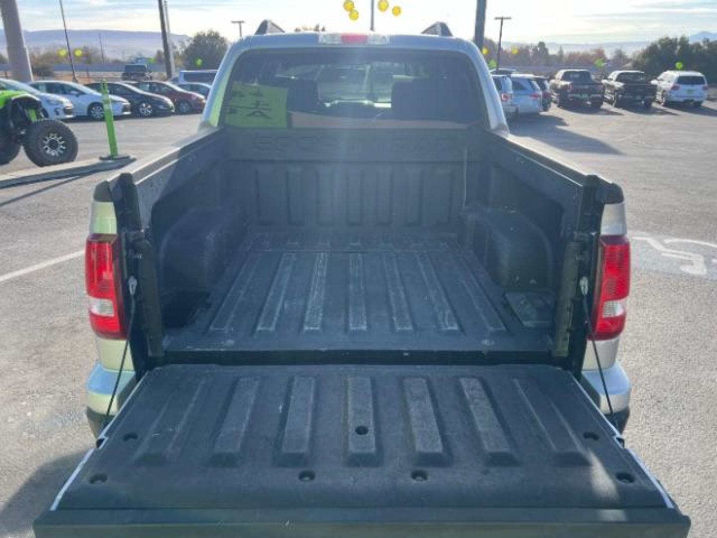 2007 Silver Birch Metalli /Camel Cloth Interior Ford Explorer Sport Trac XLT 4.0L 2WD (1FMEU31KX7U) with an 4.0L V6 SOHC 12V FFV engine, 5-Speed Automatic transmission, located at 1865 East Red Hills Pkwy, St. George, 84770, (435) 628-0023, 37.120850, -113.543640 - We specialize in helping ALL people get the best financing available. No matter your credit score, good, bad or none we can get you an amazing rate. Had a bankruptcy, divorce, or repossessions? We give you the green light to get your credit back on the road. Low down and affordable payments that fit - Photo#23