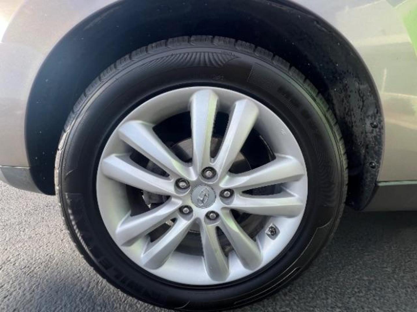 2010 Chai Bronze Metallic /Taupe Leather Interior Hyundai Tucson Limited 2WD (KM8JU3AC8AU) with an 2.4L L4 DOHC 16V engine, 6-Speed Automatic transmission, located at 940 North Main Street, Cedar City, UT, 84720, (435) 628-0023, 37.692936, -113.061897 - We specialize in helping ALL people get the best financing available. No matter your credit score, good, bad or none we can get you an amazing rate. Had a bankruptcy, divorce, or repossessions? We give you the green light to get your credit back on the road. Low down and affordable payments that fit - Photo#9