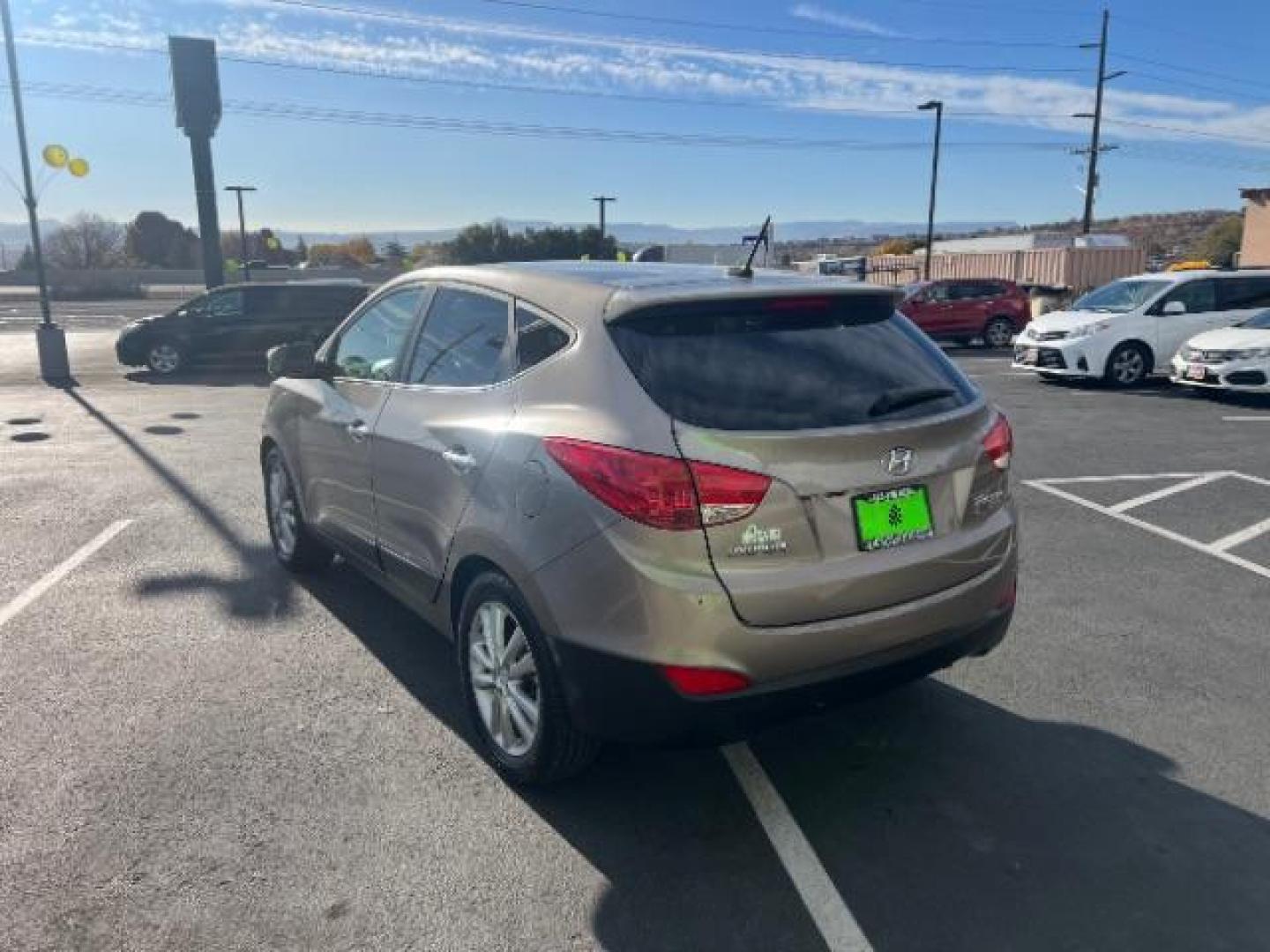 2010 Chai Bronze Metallic /Taupe Leather Interior Hyundai Tucson Limited 2WD (KM8JU3AC8AU) with an 2.4L L4 DOHC 16V engine, 6-Speed Automatic transmission, located at 940 North Main Street, Cedar City, UT, 84720, (435) 628-0023, 37.692936, -113.061897 - We specialize in helping ALL people get the best financing available. No matter your credit score, good, bad or none we can get you an amazing rate. Had a bankruptcy, divorce, or repossessions? We give you the green light to get your credit back on the road. Low down and affordable payments that fit - Photo#4