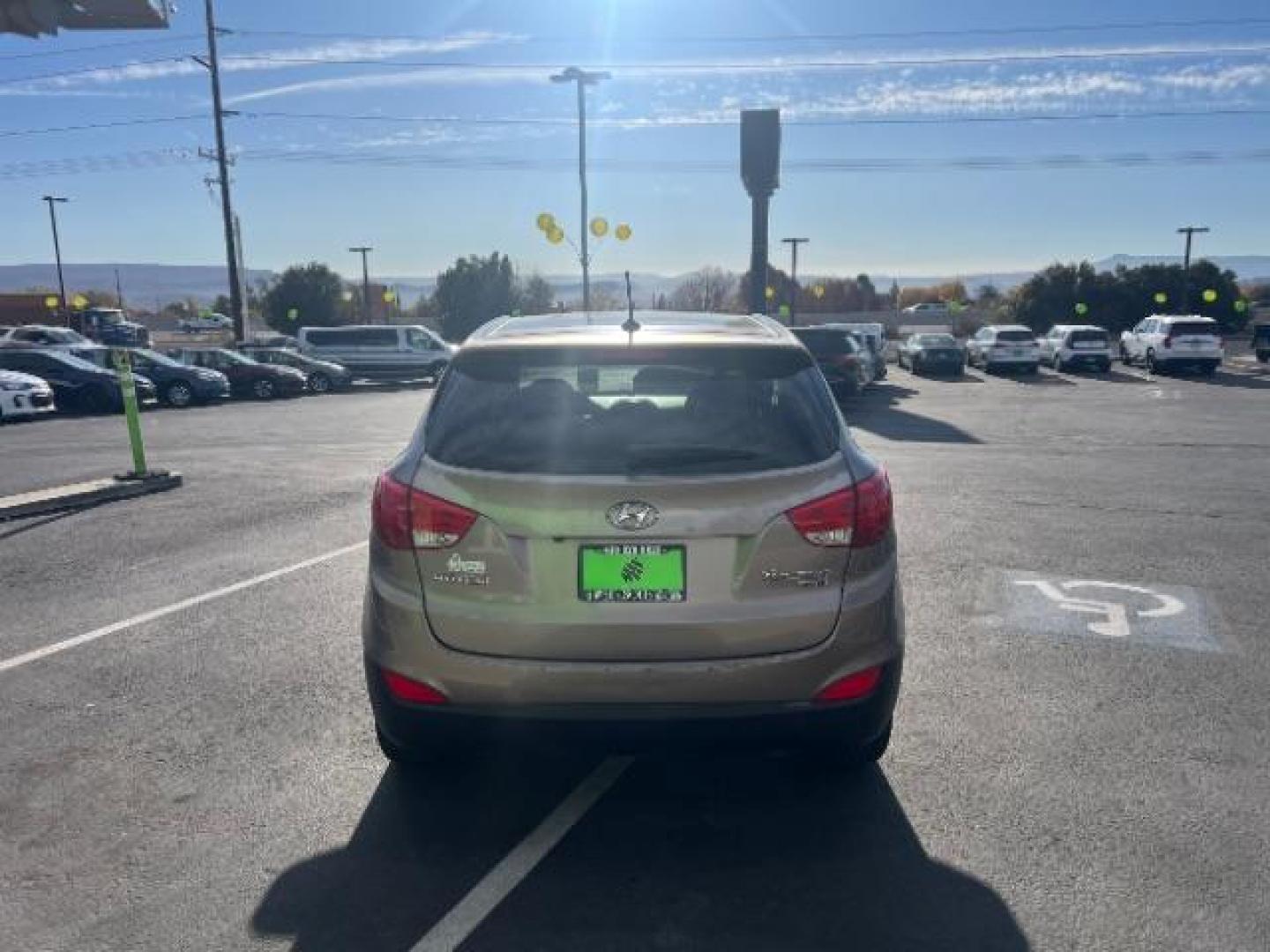 2010 Chai Bronze Metallic /Taupe Leather Interior Hyundai Tucson Limited 2WD (KM8JU3AC8AU) with an 2.4L L4 DOHC 16V engine, 6-Speed Automatic transmission, located at 940 North Main Street, Cedar City, UT, 84720, (435) 628-0023, 37.692936, -113.061897 - We specialize in helping ALL people get the best financing available. No matter your credit score, good, bad or none we can get you an amazing rate. Had a bankruptcy, divorce, or repossessions? We give you the green light to get your credit back on the road. Low down and affordable payments that fit - Photo#5