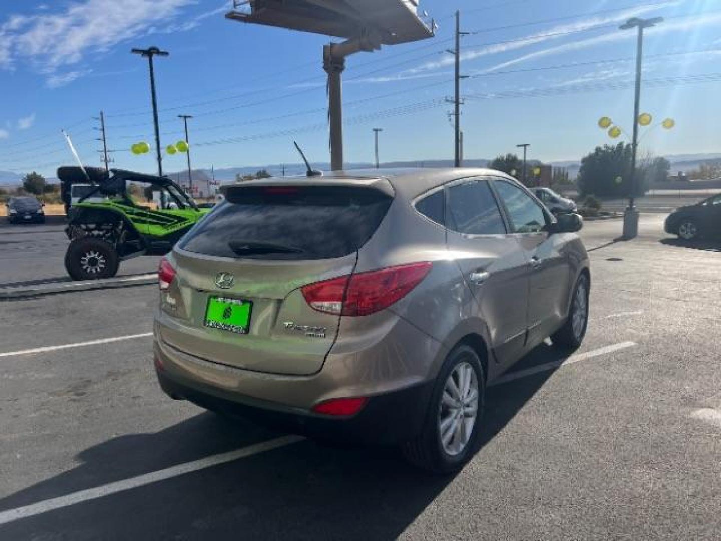 2010 Chai Bronze Metallic /Taupe Leather Interior Hyundai Tucson Limited 2WD (KM8JU3AC8AU) with an 2.4L L4 DOHC 16V engine, 6-Speed Automatic transmission, located at 940 North Main Street, Cedar City, UT, 84720, (435) 628-0023, 37.692936, -113.061897 - We specialize in helping ALL people get the best financing available. No matter your credit score, good, bad or none we can get you an amazing rate. Had a bankruptcy, divorce, or repossessions? We give you the green light to get your credit back on the road. Low down and affordable payments that fit - Photo#6