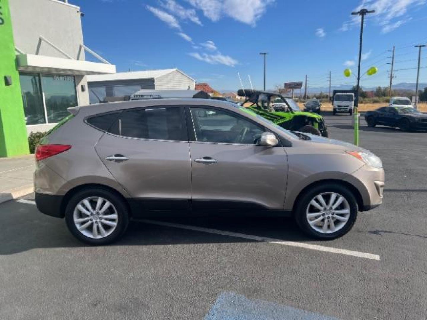 2010 Chai Bronze Metallic /Taupe Leather Interior Hyundai Tucson Limited 2WD (KM8JU3AC8AU) with an 2.4L L4 DOHC 16V engine, 6-Speed Automatic transmission, located at 940 North Main Street, Cedar City, UT, 84720, (435) 628-0023, 37.692936, -113.061897 - We specialize in helping ALL people get the best financing available. No matter your credit score, good, bad or none we can get you an amazing rate. Had a bankruptcy, divorce, or repossessions? We give you the green light to get your credit back on the road. Low down and affordable payments that fit - Photo#7