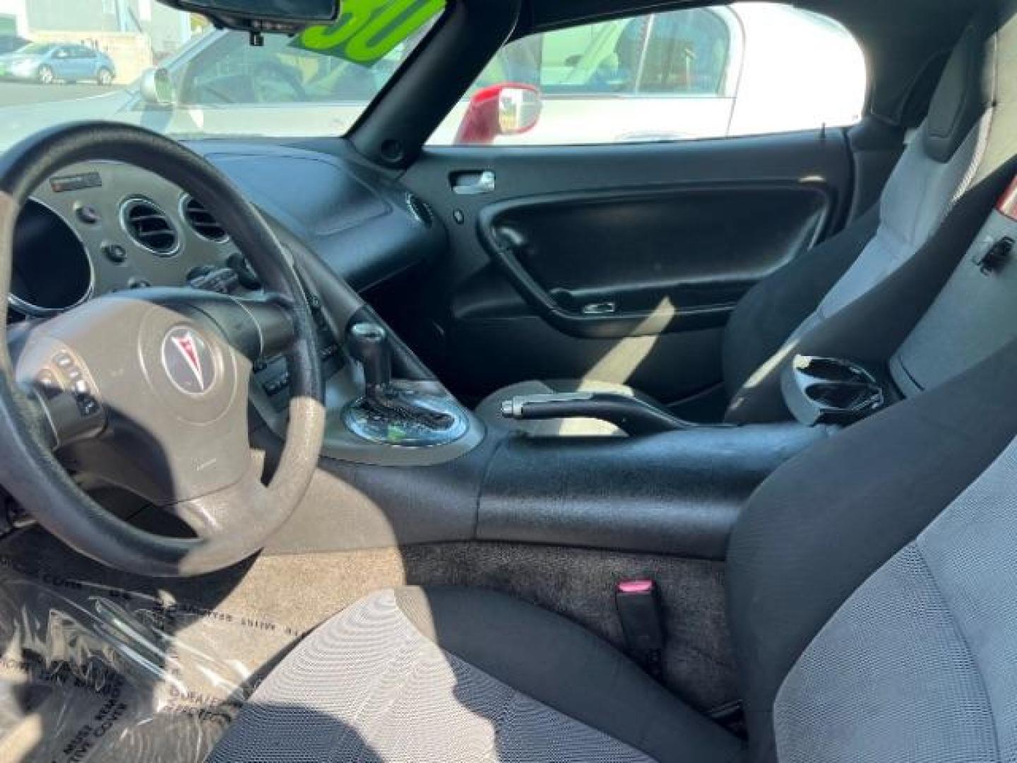 2008 Red /Ebony Cloth Interior Pontiac Solstice Base (1G2MC35B18Y) with an 2.4L L4 DOHC 16V engine, 5-Speed Automatic transmission, located at 1865 East Red Hills Pkwy, St. George, 84770, (435) 628-0023, 37.120850, -113.543640 - This vehicle is a Mechanic Special. This means it will need some love. Runs a drives fine but has body damage, leaks or other mechanical issues. It did NOT pass our 50 point inspection. Get a great deal on a less than perfect car. These cars do NOT qualify for our in house financing. Cash and carry, - Photo#6