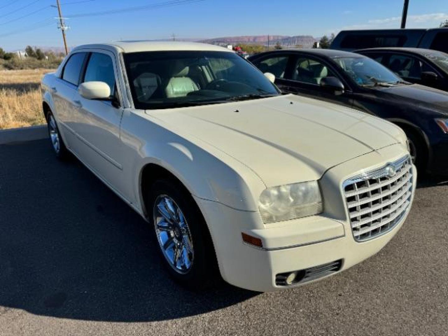 2005 Cool Vanilla /Dark Slate Gray/Light Graystone Leather Interior Chrysler 300 Touring (2C3JA53G25H) with an 3.5L V6 DOHC 24V engine, 4-Speed Automatic transmission, located at 1865 East Red Hills Pkwy, St. George, 84770, (435) 628-0023, 37.120850, -113.543640 - Photo#0