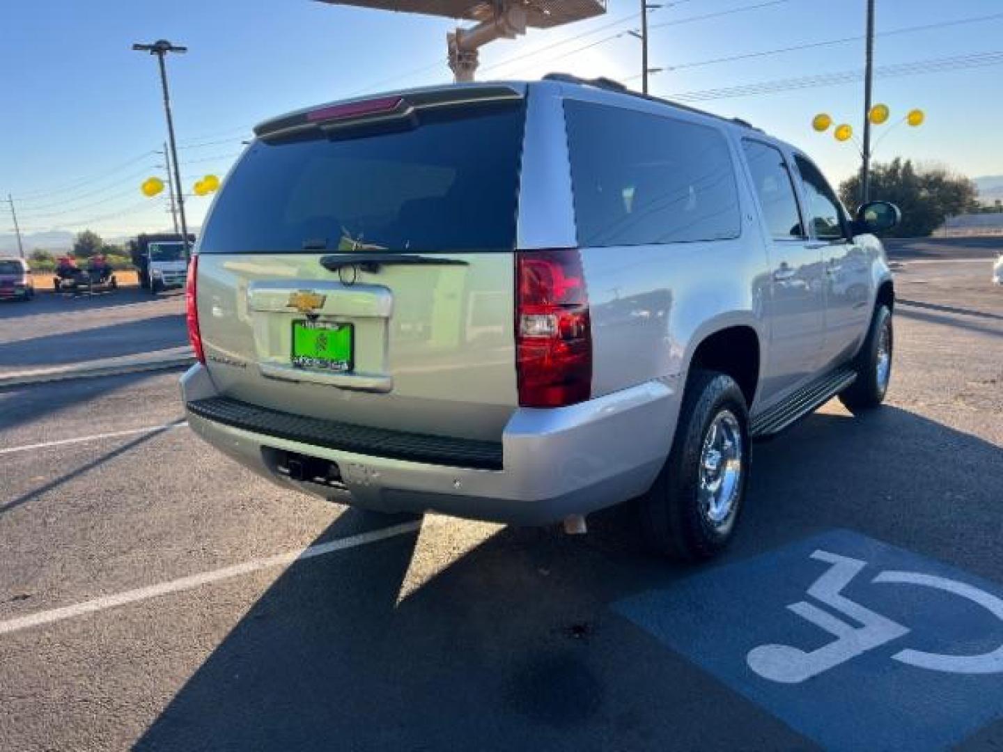 2014 Silver Ice Metallic /Ebony Chevrolet Suburban LT 1500 4WD (1GNSKJE73ER) with an 5.3L V8 OHV 16V FFV engine, 6-Speed Automatic transmission, located at 1865 East Red Hills Pkwy, St. George, 84770, (435) 628-0023, 37.120850, -113.543640 - We specialize in helping ALL people get the best financing available. No matter your credit score, good, bad or none we can get you an amazing rate. Had a bankruptcy, divorce, or repossessions? We give you the green light to get your credit back on the road. Low down and affordable payments that fit - Photo#6