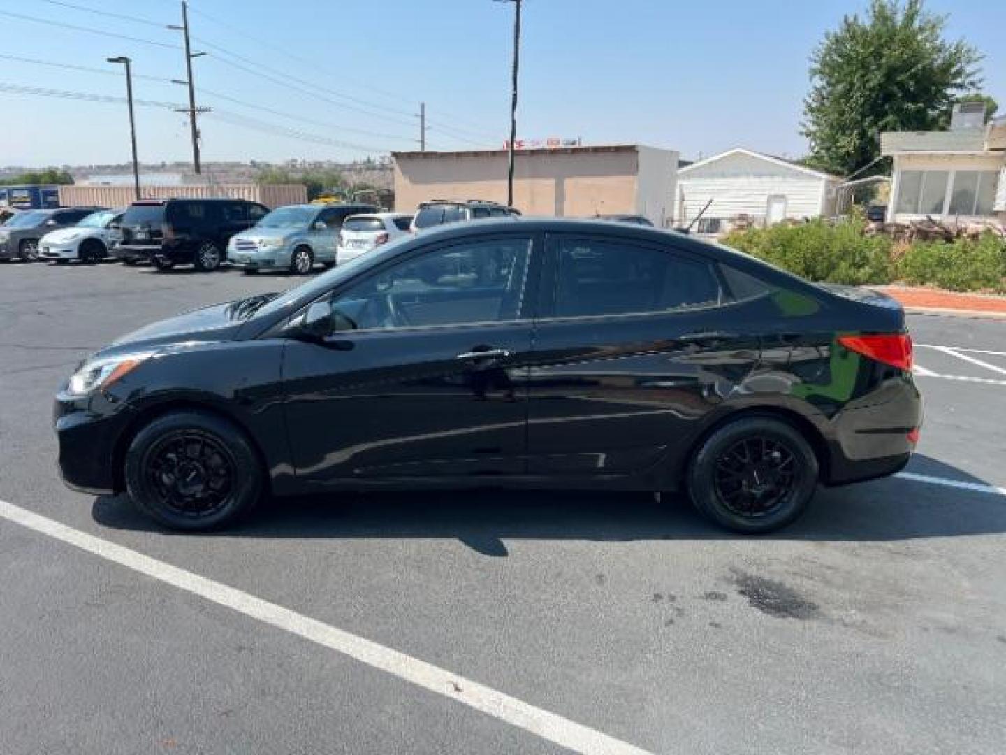 2016 Ultra Black /Beige, cloth Hyundai Accent SE 4-Door 6A (KMHCT4AE7GU) with an 1.6L L4 DOHC 16V engine, 6 Speed manual transmission, located at 940 North Main Street, Cedar City, UT, 84720, (435) 628-0023, 37.692936, -113.061897 - We specialize in helping ALL people get the best financing available. No matter your credit score, good, bad or none we can get you an amazing rate. Had a bankruptcy, divorce, or repossessions? We give you the green light to get your credit back on the road. Low down and affordable payments that fit - Photo#3