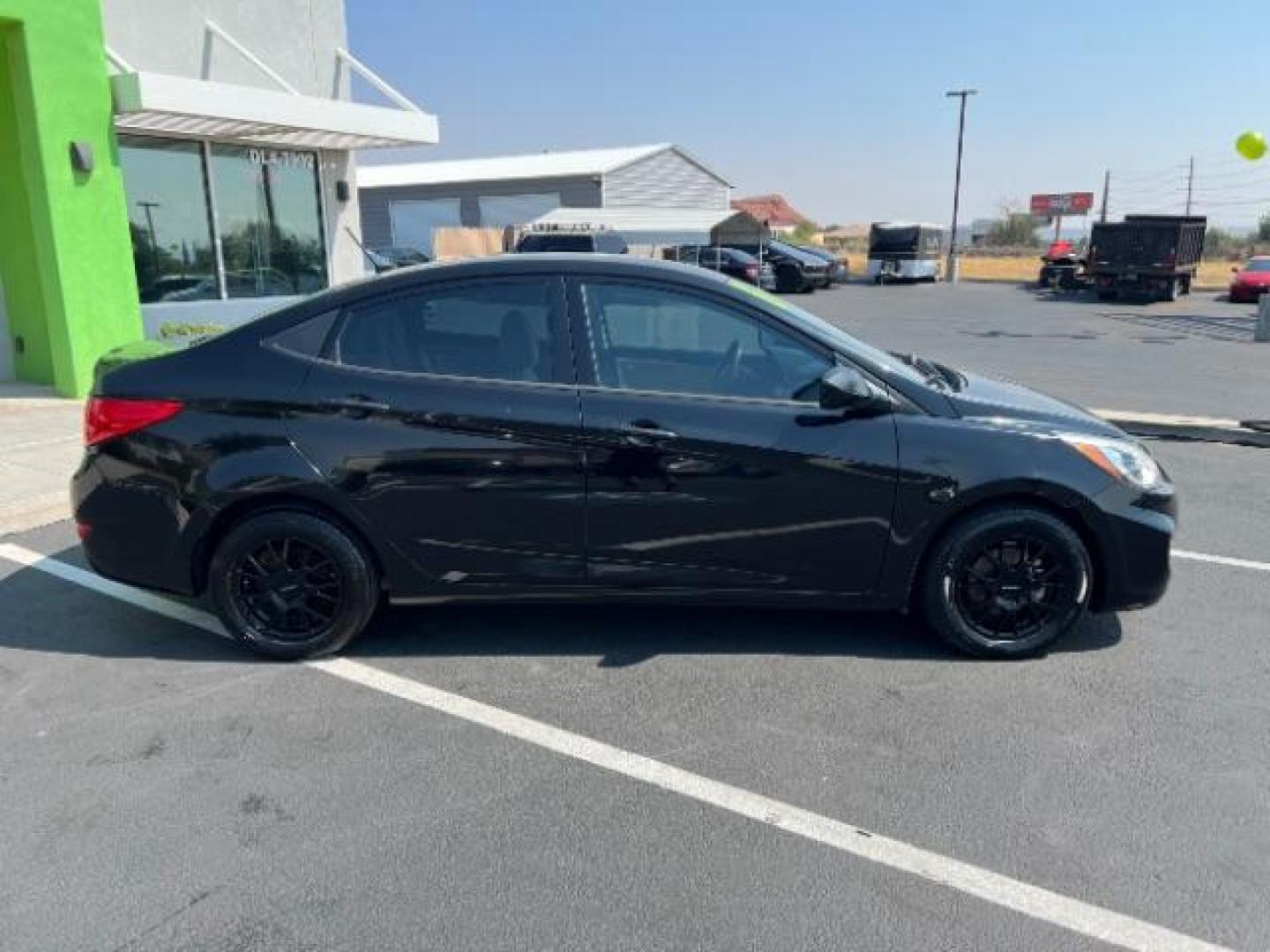 2016 Ultra Black /Beige, cloth Hyundai Accent SE 4-Door 6A (KMHCT4AE7GU) with an 1.6L L4 DOHC 16V engine, 6 Speed manual transmission, located at 940 North Main Street, Cedar City, UT, 84720, (435) 628-0023, 37.692936, -113.061897 - We specialize in helping ALL people get the best financing available. No matter your credit score, good, bad or none we can get you an amazing rate. Had a bankruptcy, divorce, or repossessions? We give you the green light to get your credit back on the road. Low down and affordable payments that fit - Photo#7