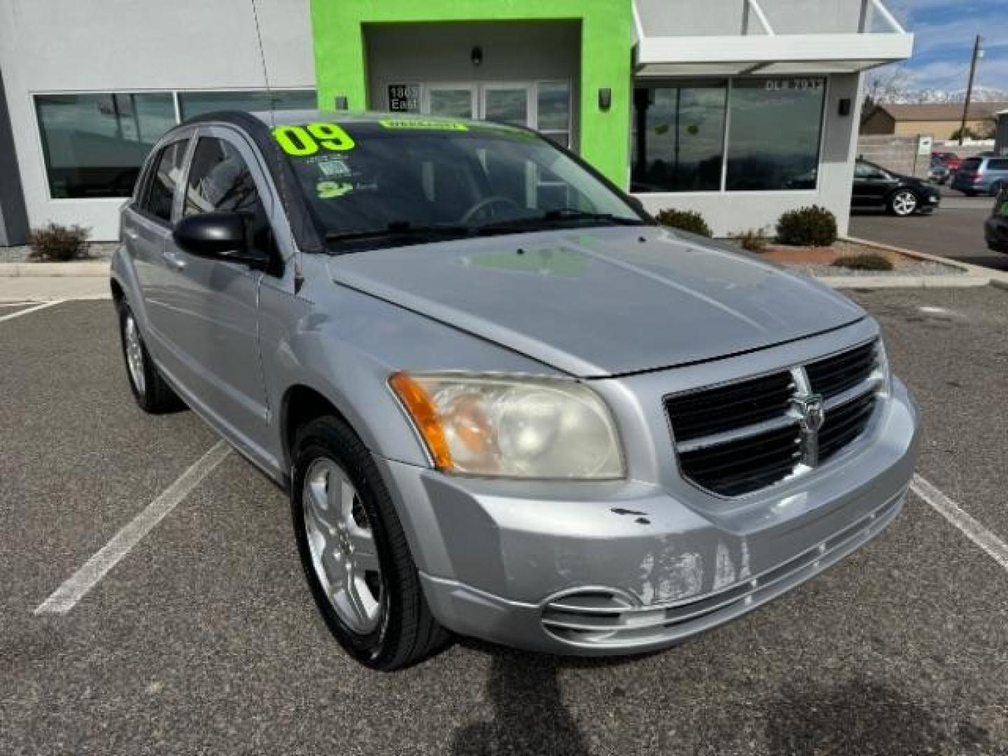 2009 Bright Silver Metallic /Dark Slate Gray Cloth Interior Dodge Caliber SXT (1B3HB48A99D) with an 2.0L L4 DOHC 16V engine, Continuously Variable Transmission transmission, located at 1865 East Red Hills Pkwy, St. George, 84770, (435) 628-0023, 37.120850, -113.543640 - Photo#1