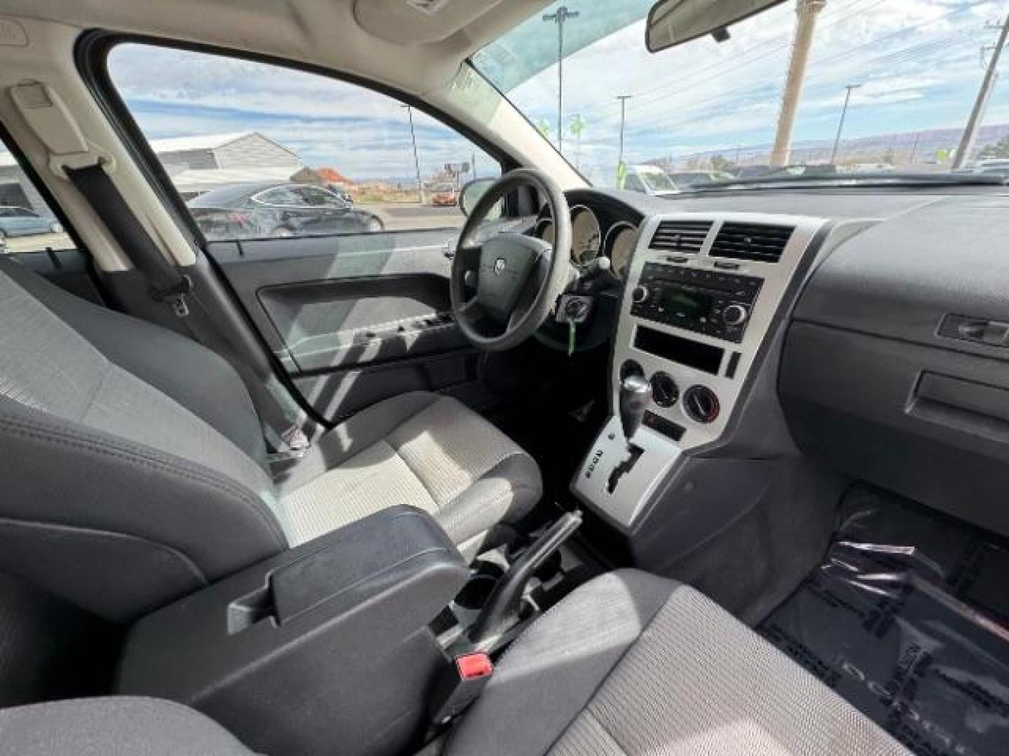 2009 Bright Silver Metallic /Dark Slate Gray Cloth Interior Dodge Caliber SXT (1B3HB48A99D) with an 2.0L L4 DOHC 16V engine, Continuously Variable Transmission transmission, located at 1865 East Red Hills Pkwy, St. George, 84770, (435) 628-0023, 37.120850, -113.543640 - We specialize in helping ALL people get the best financing available. No matter your credit score, good, bad or none we can get you an amazing rate. Had a bankruptcy, divorce, or repossessions? We give you the green light to get your credit back on the road. Low down and affordable payments that fit - Photo#29