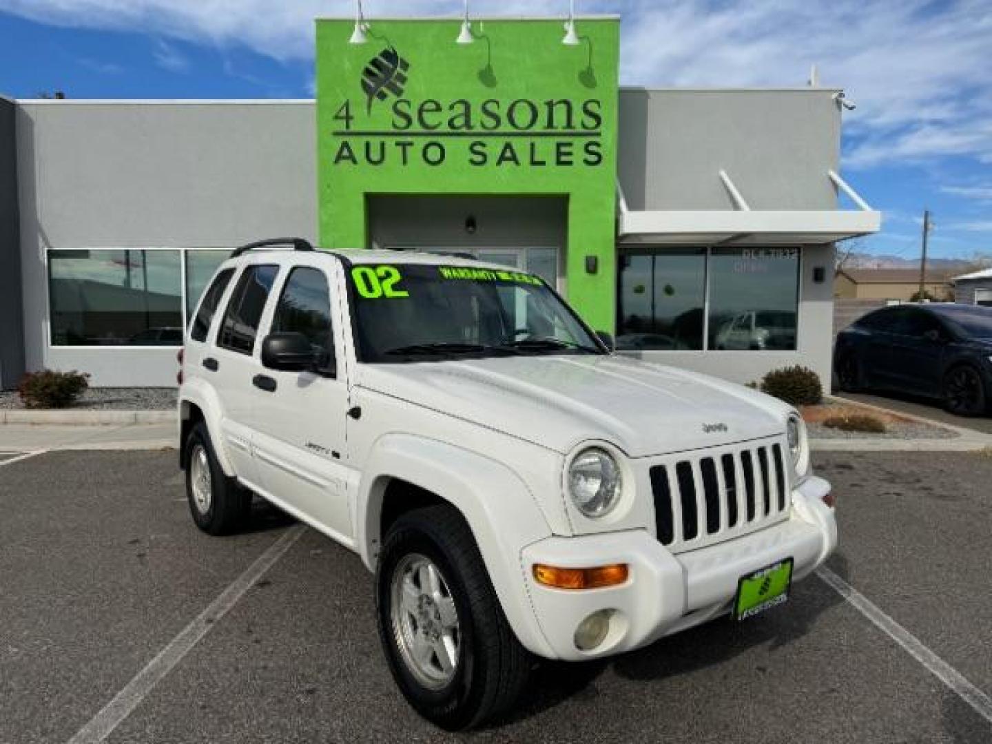 2002 Stone White /Dark Slate Gray Clot Jeep Liberty Limited 4WD (1J4GL58K62W) with an 3.7L V6 SOHC 12V engine, 4-Speed Automatic transmission, located at 1865 East Red Hills Pkwy, St. George, 84770, (435) 628-0023, 37.120850, -113.543640 - Photo#0