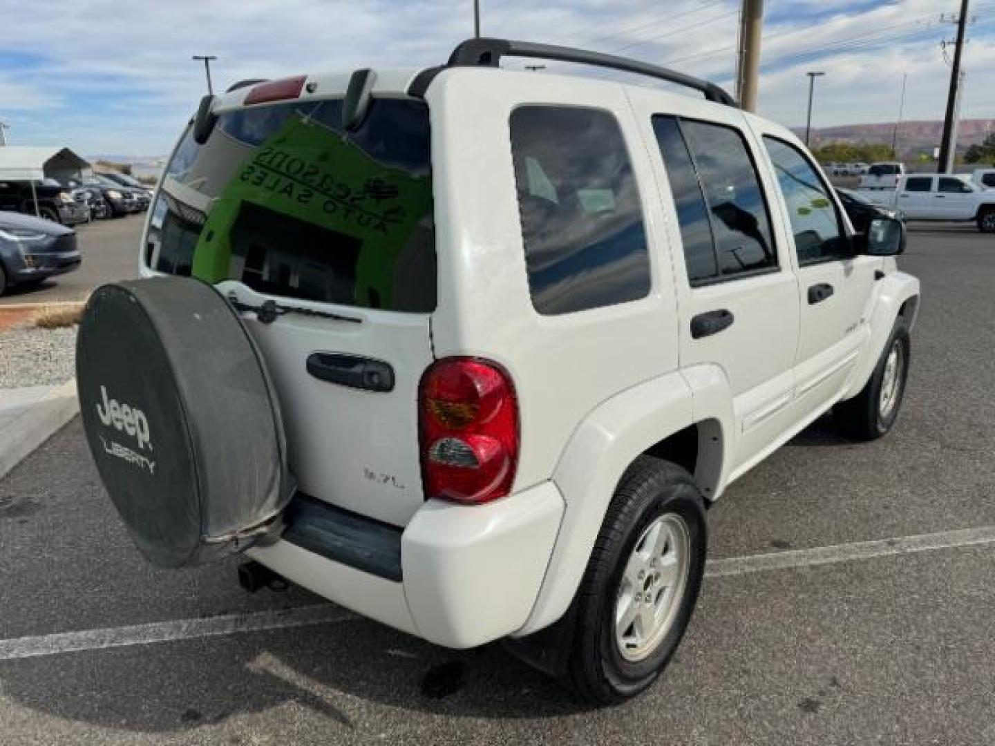 2002 Stone White /Dark Slate Gray Clot Jeep Liberty Limited 4WD (1J4GL58K62W) with an 3.7L V6 SOHC 12V engine, 4-Speed Automatic transmission, located at 1865 East Red Hills Pkwy, St. George, 84770, (435) 628-0023, 37.120850, -113.543640 - Photo#9