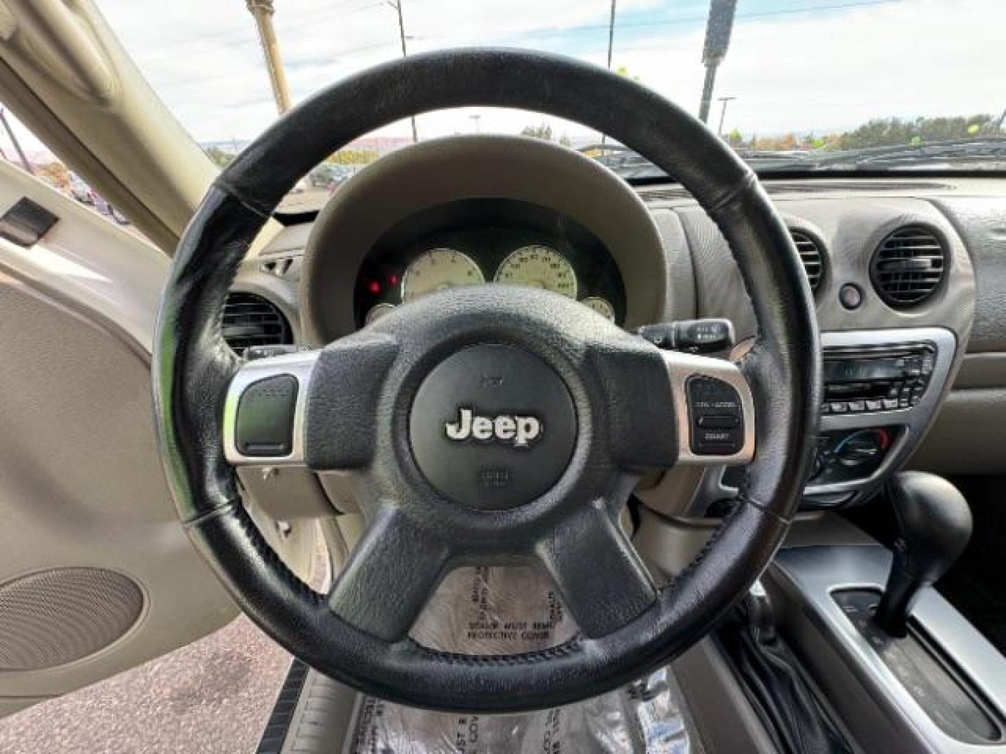 2002 Stone White /Dark Slate Gray Clot Jeep Liberty Limited 4WD (1J4GL58K62W) with an 3.7L V6 SOHC 12V engine, 4-Speed Automatic transmission, located at 1865 East Red Hills Pkwy, St. George, 84770, (435) 628-0023, 37.120850, -113.543640 - Photo#20