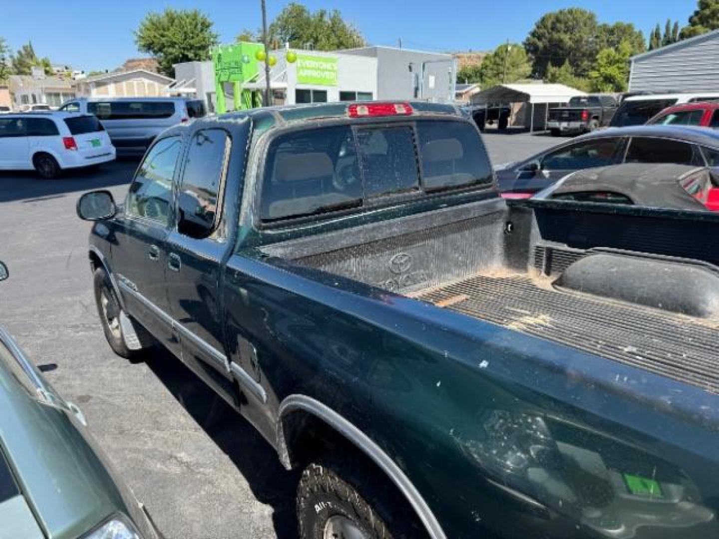 2000 Imperial Jade Mica /Oak Cloth Toyota Tundra SR5 Access Cab 4WD (5TBBT441XYS) with an 4.7L V8 DOHC 32V engine, 4-Speed Automatic transmission, located at 1865 East Red Hills Pkwy, St. George, 84770, (435) 628-0023, 37.120850, -113.543640 - This vehicle is a Mechanic Special. This means it will need some love. Runs a drives fine but has body damage, leaks or other mechanical issues. It did NOT pass our 50 point inspection. Get a great deal on a less than perfect car. These cars do NOT qualify for our in house financing. Cash and carry, - Photo#3