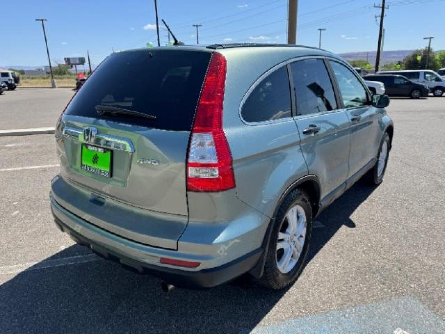 2010 Opal Sage Metallic /Ivory Cloth Interior Honda CR-V EX 4WD 5-Speed AT (5J6RE4H53AL) with an 2.4L L4 DOHC 16V engine, 5-Speed Automatic transmission, located at 940 North Main Street, Cedar City, UT, 84720, (435) 628-0023, 37.692936, -113.061897 - Photo#9