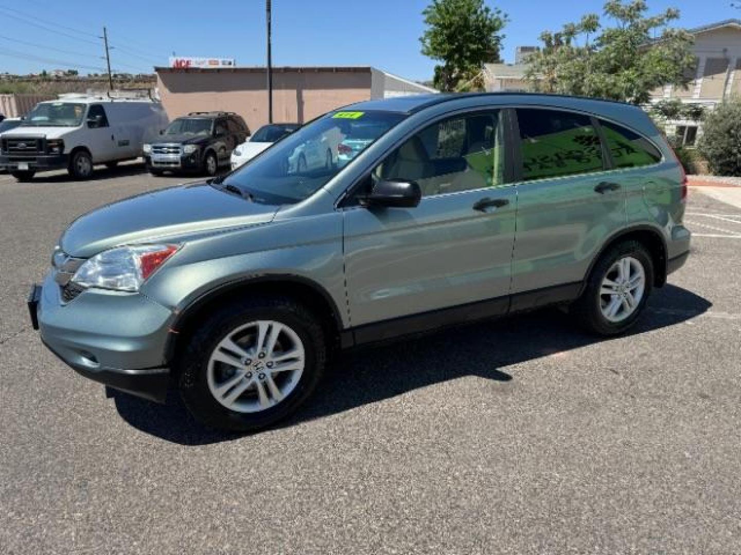 2010 Opal Sage Metallic /Ivory Cloth Interior Honda CR-V EX 4WD 5-Speed AT (5J6RE4H53AL) with an 2.4L L4 DOHC 16V engine, 5-Speed Automatic transmission, located at 940 North Main Street, Cedar City, UT, 84720, (435) 628-0023, 37.692936, -113.061897 - Photo#4