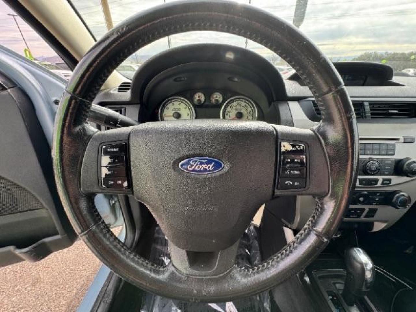 2009 Light Ice Blue Metal /Charcoal Black Cloth Ford Focus SE Sedan (1FAHP35N89W) with an 2.0L L4 DOHC 16V engine, 4-Speed Automatic transmission, located at 1865 East Red Hills Pkwy, St. George, 84770, (435) 628-0023, 37.120850, -113.543640 - We specialize in helping ALL people get the best financing available. No matter your credit score, good, bad or none we can get you an amazing rate. Had a bankruptcy, divorce, or repossessions? We give you the green light to get your credit back on the road. Low down and affordable payments that fit - Photo#20