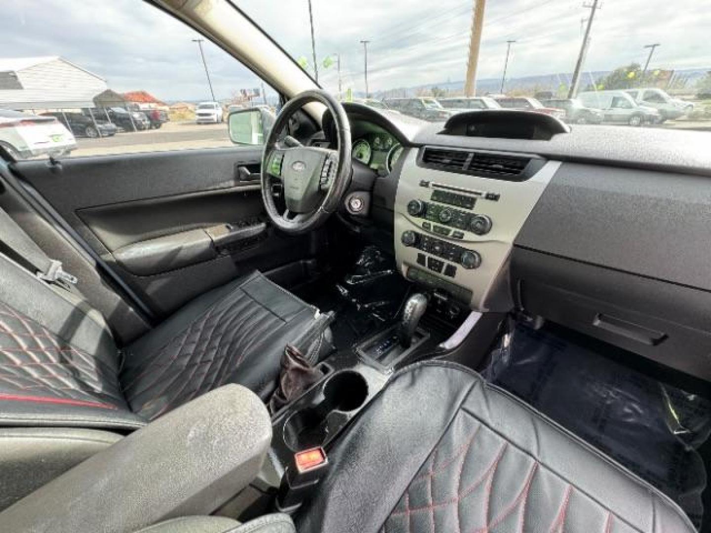 2009 Light Ice Blue Metal /Charcoal Black Cloth Ford Focus SE Sedan (1FAHP35N89W) with an 2.0L L4 DOHC 16V engine, 4-Speed Automatic transmission, located at 1865 East Red Hills Pkwy, St. George, 84770, (435) 628-0023, 37.120850, -113.543640 - We specialize in helping ALL people get the best financing available. No matter your credit score, good, bad or none we can get you an amazing rate. Had a bankruptcy, divorce, or repossessions? We give you the green light to get your credit back on the road. Low down and affordable payments that fit - Photo#30