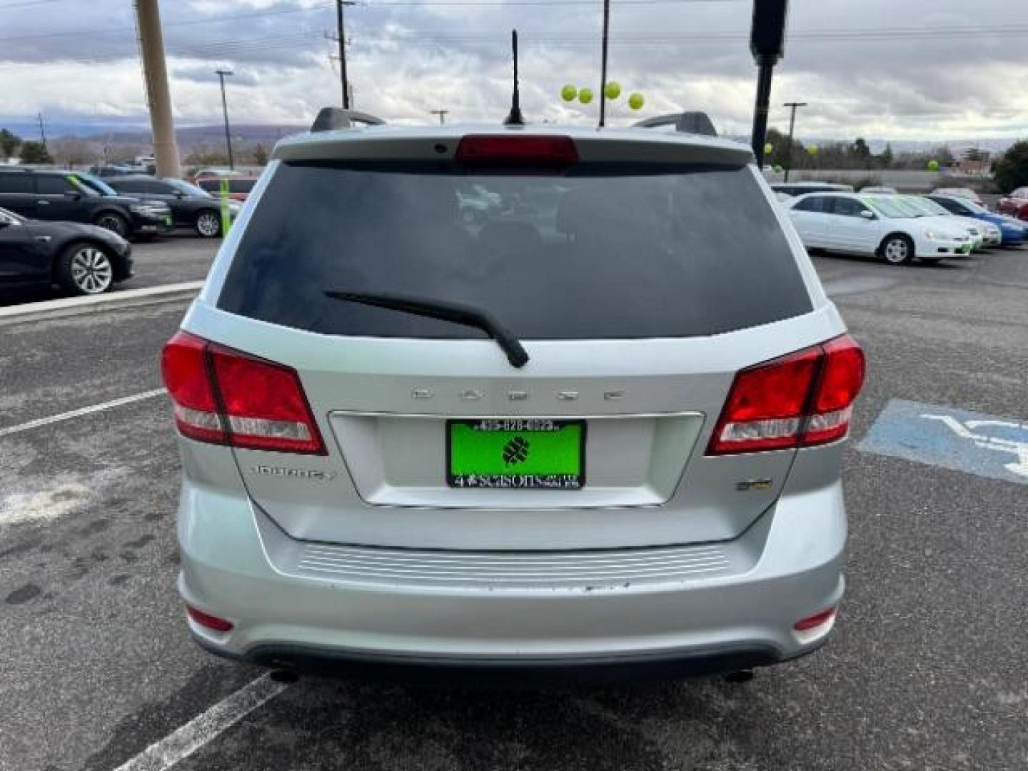 2012 Bright Silver Metall /Black Cloth Interior Dodge Journey SXT (3C4PDCBG8CT) with an 3.6L V6 DOHC 24V engine, 6-Speed Automatic transmission, located at 940 North Main Street, Cedar City, UT, 84720, (435) 628-0023, 37.692936, -113.061897 - Photo#8