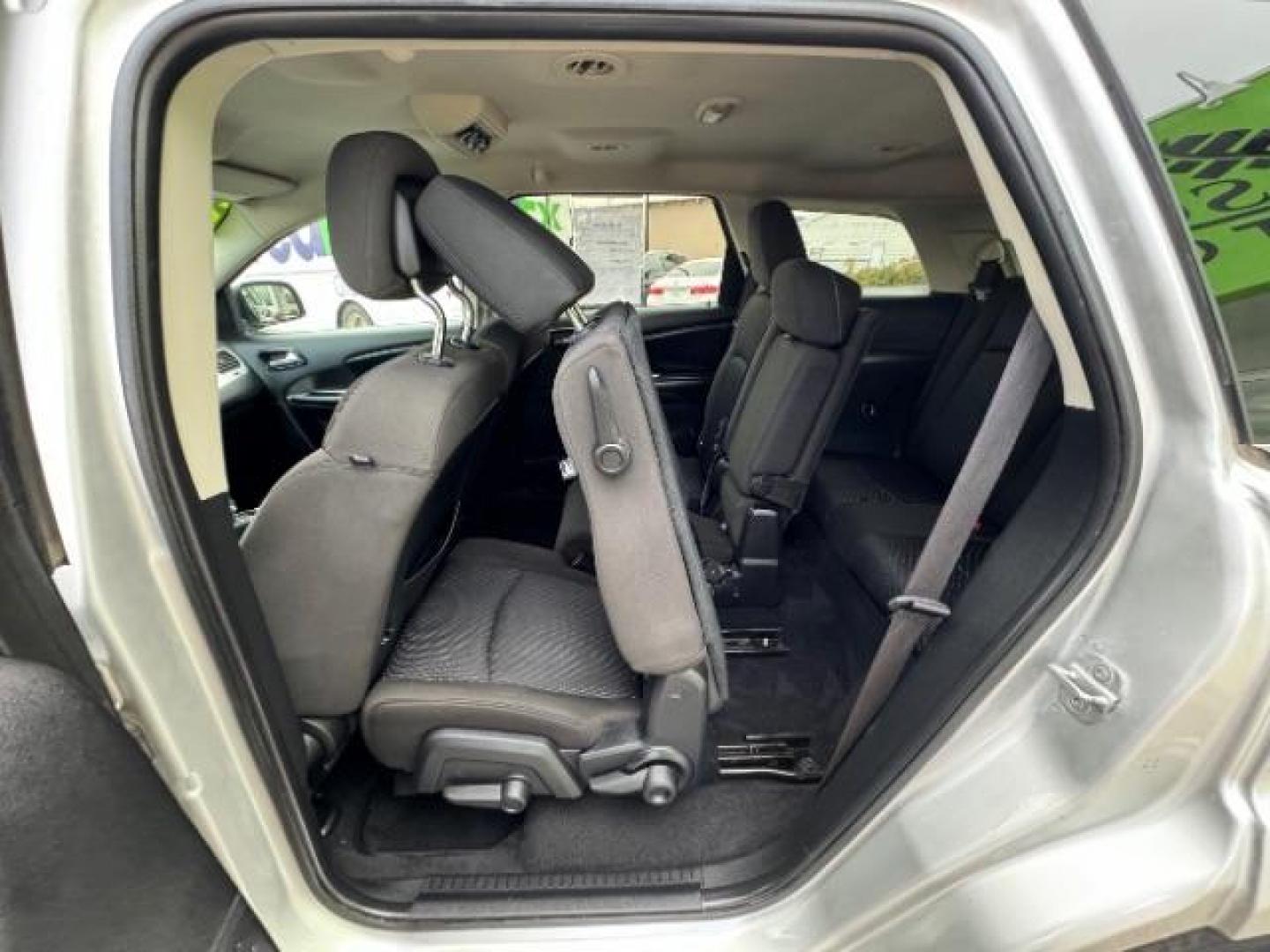 2012 Bright Silver Metall /Black Cloth Interior Dodge Journey SXT (3C4PDCBG8CT) with an 3.6L V6 DOHC 24V engine, 6-Speed Automatic transmission, located at 940 North Main Street, Cedar City, UT, 84720, (435) 628-0023, 37.692936, -113.061897 - Photo#27