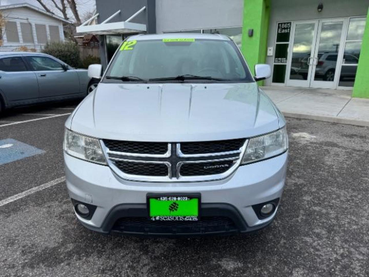 2012 Bright Silver Metall /Black Cloth Interior Dodge Journey SXT (3C4PDCBG8CT) with an 3.6L V6 DOHC 24V engine, 6-Speed Automatic transmission, located at 940 North Main Street, Cedar City, UT, 84720, (435) 628-0023, 37.692936, -113.061897 - Photo#2