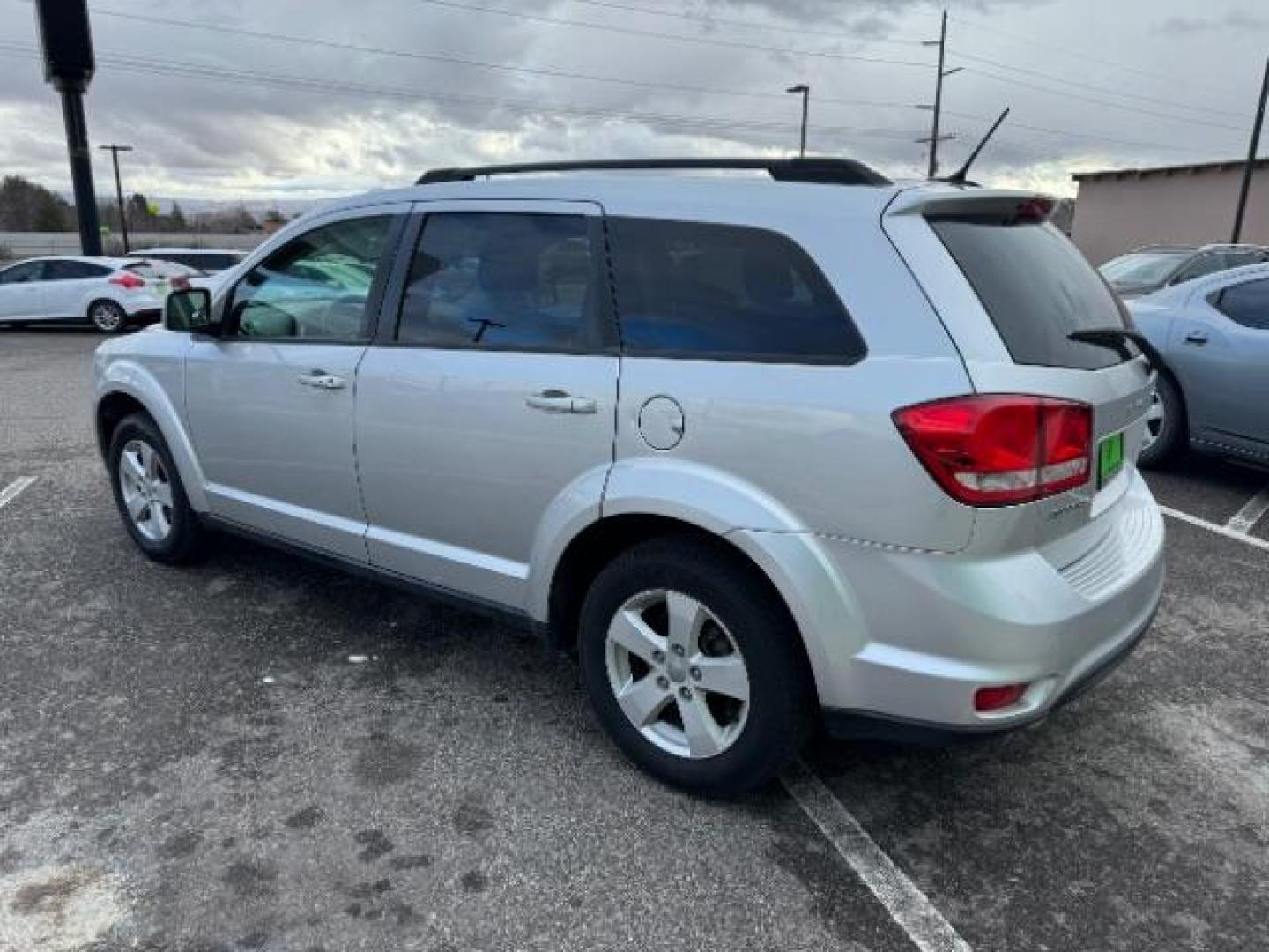 2012 Bright Silver Metall /Black Cloth Interior Dodge Journey SXT (3C4PDCBG8CT) with an 3.6L V6 DOHC 24V engine, 6-Speed Automatic transmission, located at 940 North Main Street, Cedar City, UT, 84720, (435) 628-0023, 37.692936, -113.061897 - Photo#6