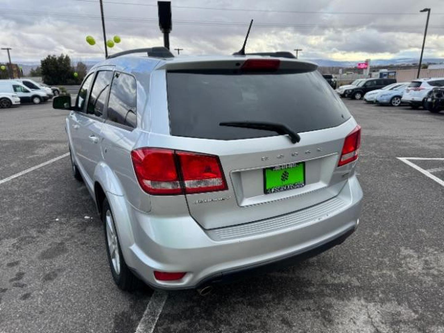 2012 Bright Silver Metall /Black Cloth Interior Dodge Journey SXT (3C4PDCBG8CT) with an 3.6L V6 DOHC 24V engine, 6-Speed Automatic transmission, located at 940 North Main Street, Cedar City, UT, 84720, (435) 628-0023, 37.692936, -113.061897 - Photo#7