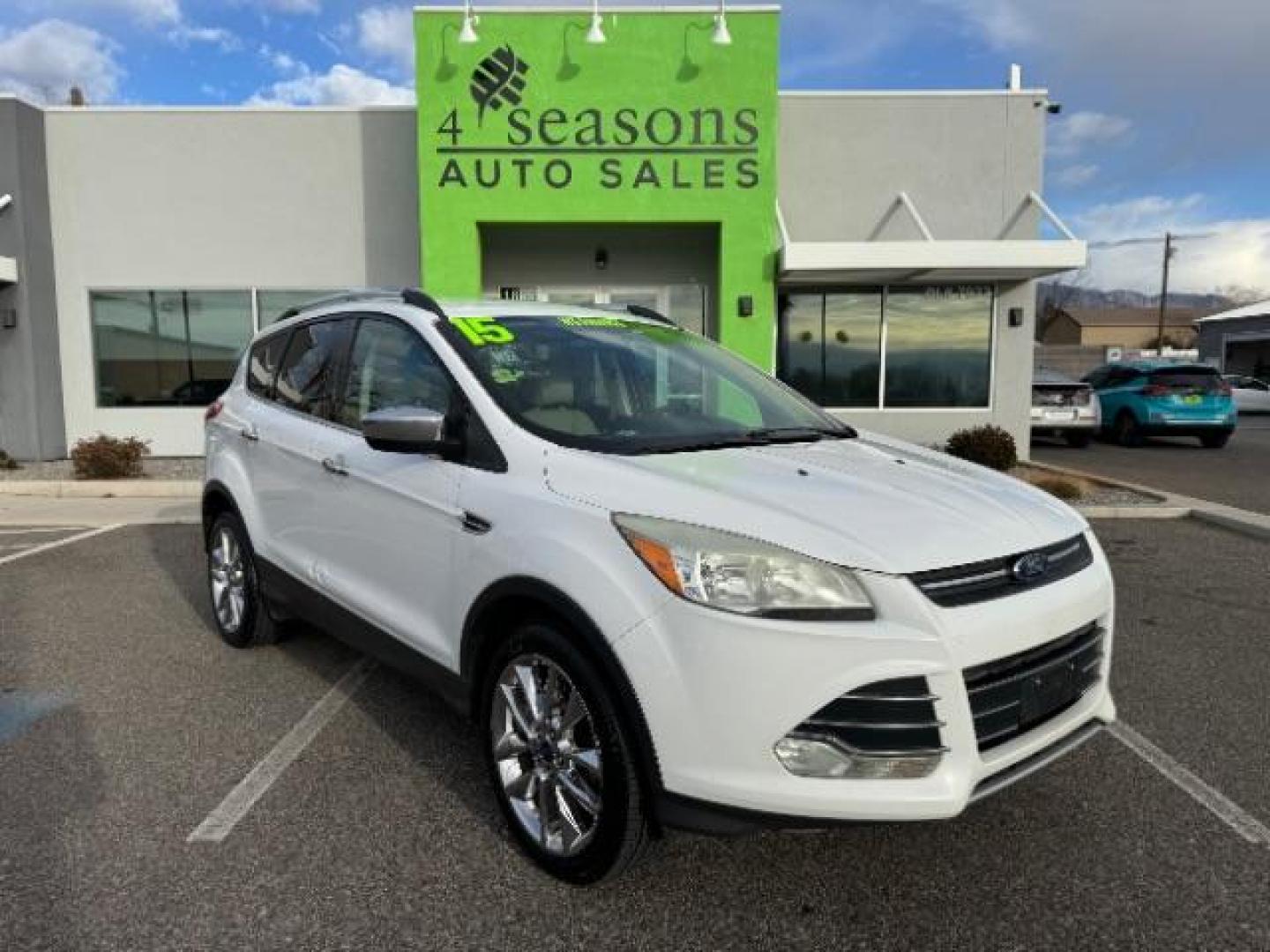 2015 Oxford White /Charcoal Black Ford Escape SE FWD (1FMCU0GX1FU) with an 1.6L L4 DOHC 16V engine, 6-Speed Automatic transmission, located at 1865 East Red Hills Pkwy, St. George, 84770, (435) 628-0023, 37.120850, -113.543640 - Photo#0