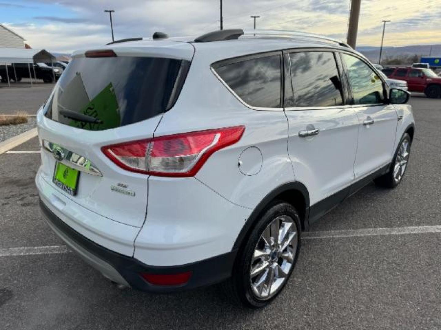 2015 Oxford White /Charcoal Black Ford Escape SE FWD (1FMCU0GX1FU) with an 1.6L L4 DOHC 16V engine, 6-Speed Automatic transmission, located at 1865 East Red Hills Pkwy, St. George, 84770, (435) 628-0023, 37.120850, -113.543640 - Photo#9