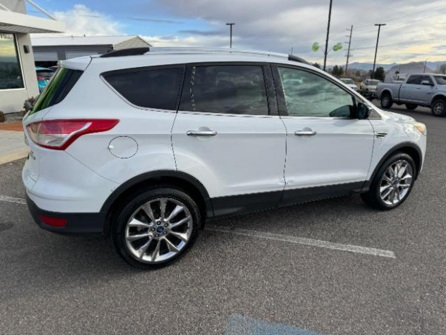 2015 Oxford White /Charcoal Black Ford Escape SE FWD (1FMCU0GX1FU) with an 1.6L L4 DOHC 16V engine, 6-Speed Automatic transmission, located at 1865 East Red Hills Pkwy, St. George, 84770, (435) 628-0023, 37.120850, -113.543640 - Photo#10