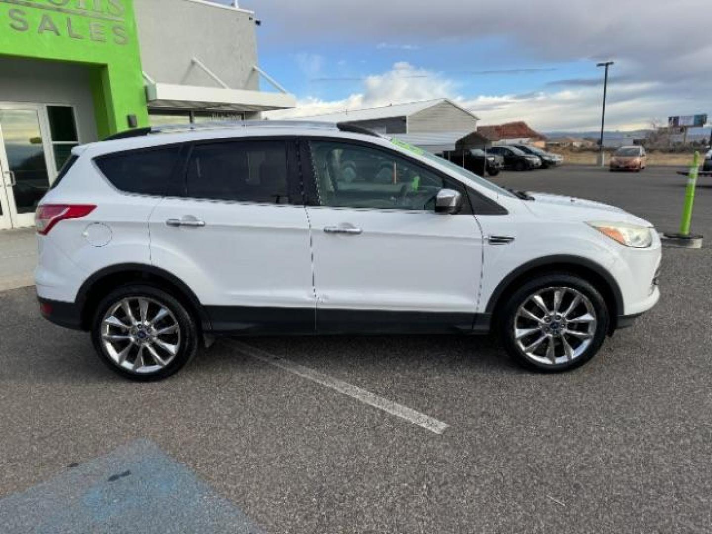 2015 Oxford White /Charcoal Black Ford Escape SE FWD (1FMCU0GX1FU) with an 1.6L L4 DOHC 16V engine, 6-Speed Automatic transmission, located at 1865 East Red Hills Pkwy, St. George, 84770, (435) 628-0023, 37.120850, -113.543640 - Photo#11