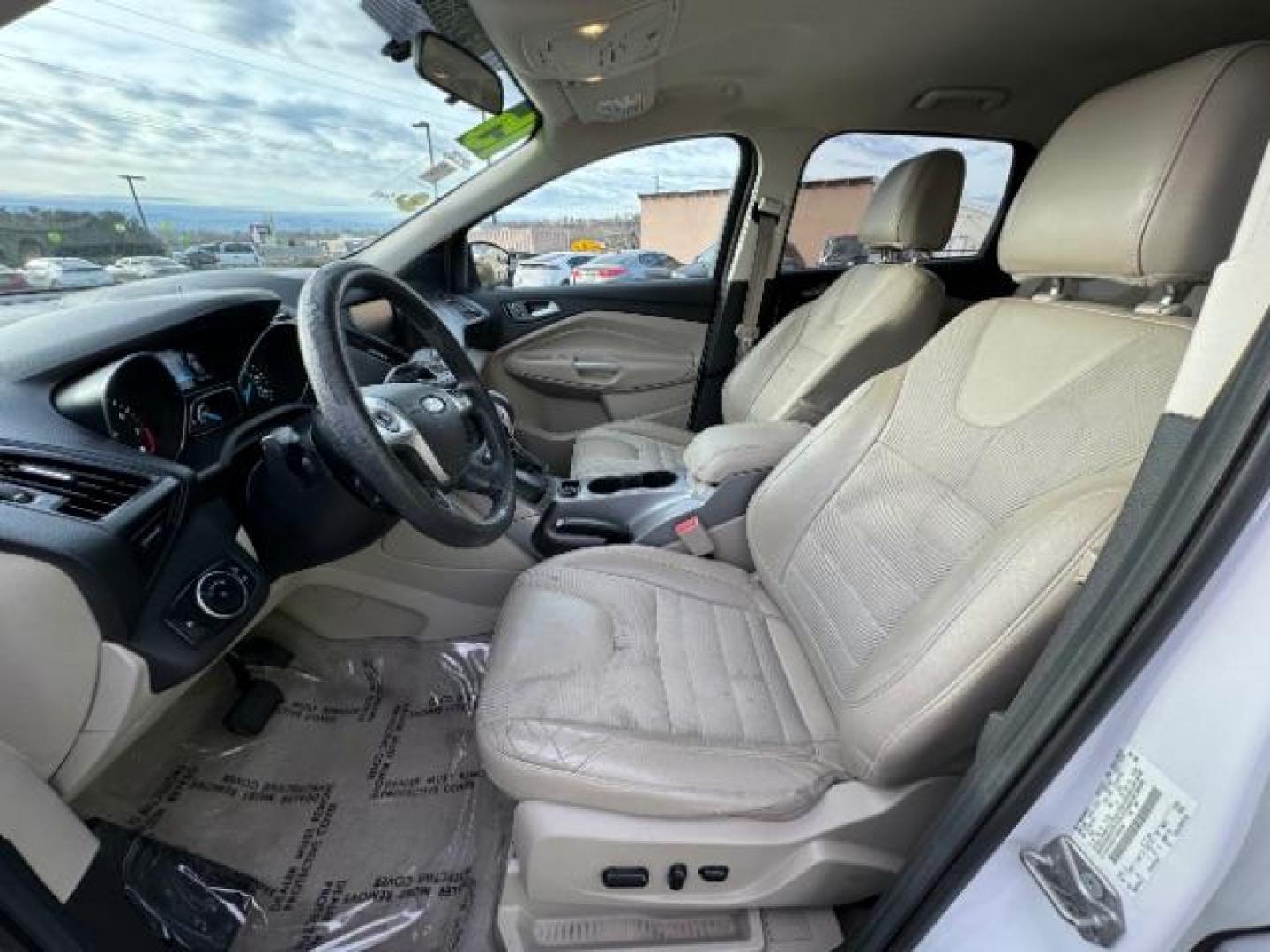 2015 Oxford White /Charcoal Black Ford Escape SE FWD (1FMCU0GX1FU) with an 1.6L L4 DOHC 16V engine, 6-Speed Automatic transmission, located at 1865 East Red Hills Pkwy, St. George, 84770, (435) 628-0023, 37.120850, -113.543640 - Photo#18