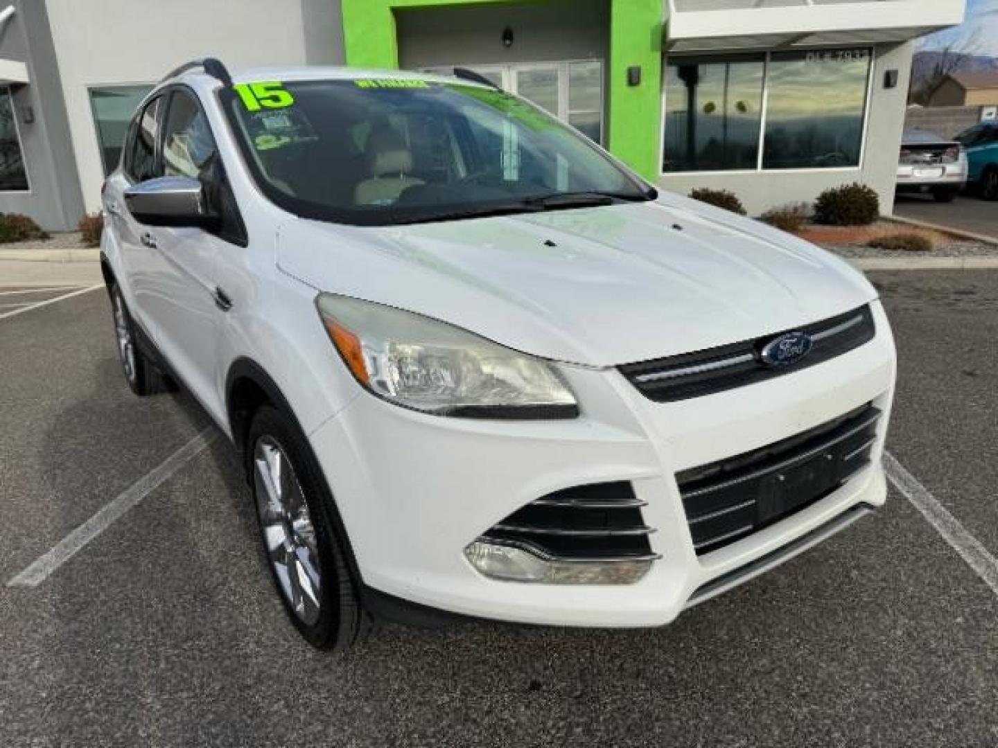 2015 Oxford White /Charcoal Black Ford Escape SE FWD (1FMCU0GX1FU) with an 1.6L L4 DOHC 16V engine, 6-Speed Automatic transmission, located at 1865 East Red Hills Pkwy, St. George, 84770, (435) 628-0023, 37.120850, -113.543640 - Photo#1