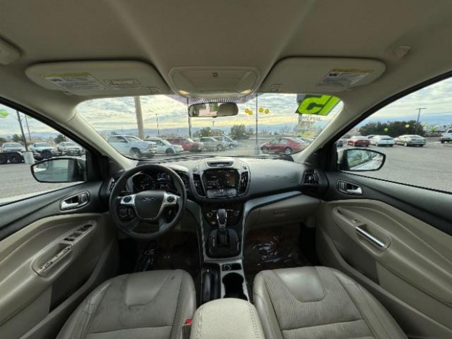 2015 Oxford White /Charcoal Black Ford Escape SE FWD (1FMCU0GX1FU) with an 1.6L L4 DOHC 16V engine, 6-Speed Automatic transmission, located at 1865 East Red Hills Pkwy, St. George, 84770, (435) 628-0023, 37.120850, -113.543640 - Photo#28