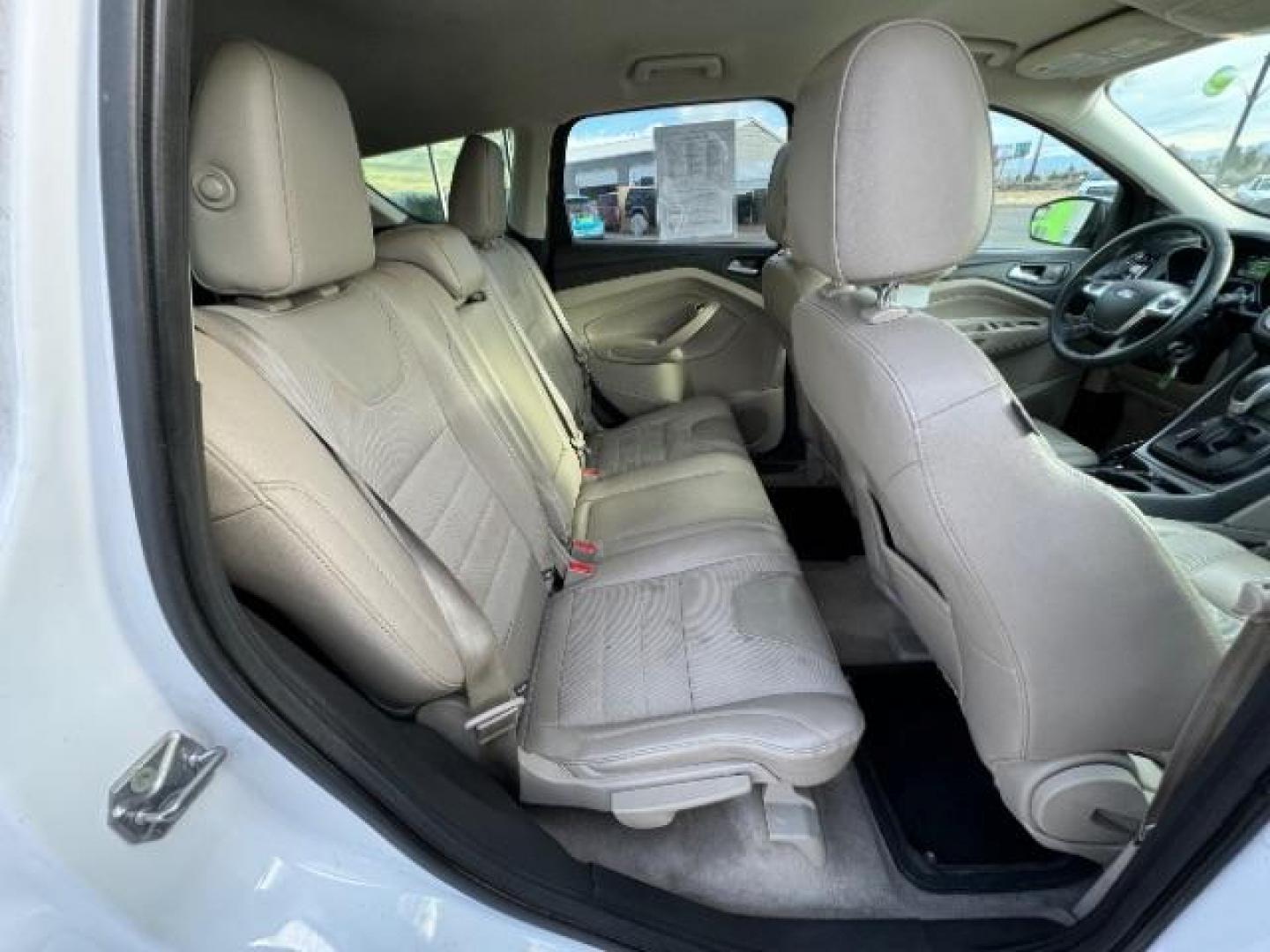 2015 Oxford White /Charcoal Black Ford Escape SE FWD (1FMCU0GX1FU) with an 1.6L L4 DOHC 16V engine, 6-Speed Automatic transmission, located at 1865 East Red Hills Pkwy, St. George, 84770, (435) 628-0023, 37.120850, -113.543640 - Photo#32